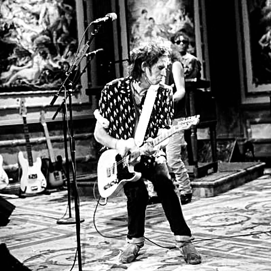 Keith Richards hangs out at a Tribeca dive bar back in 1988, right
