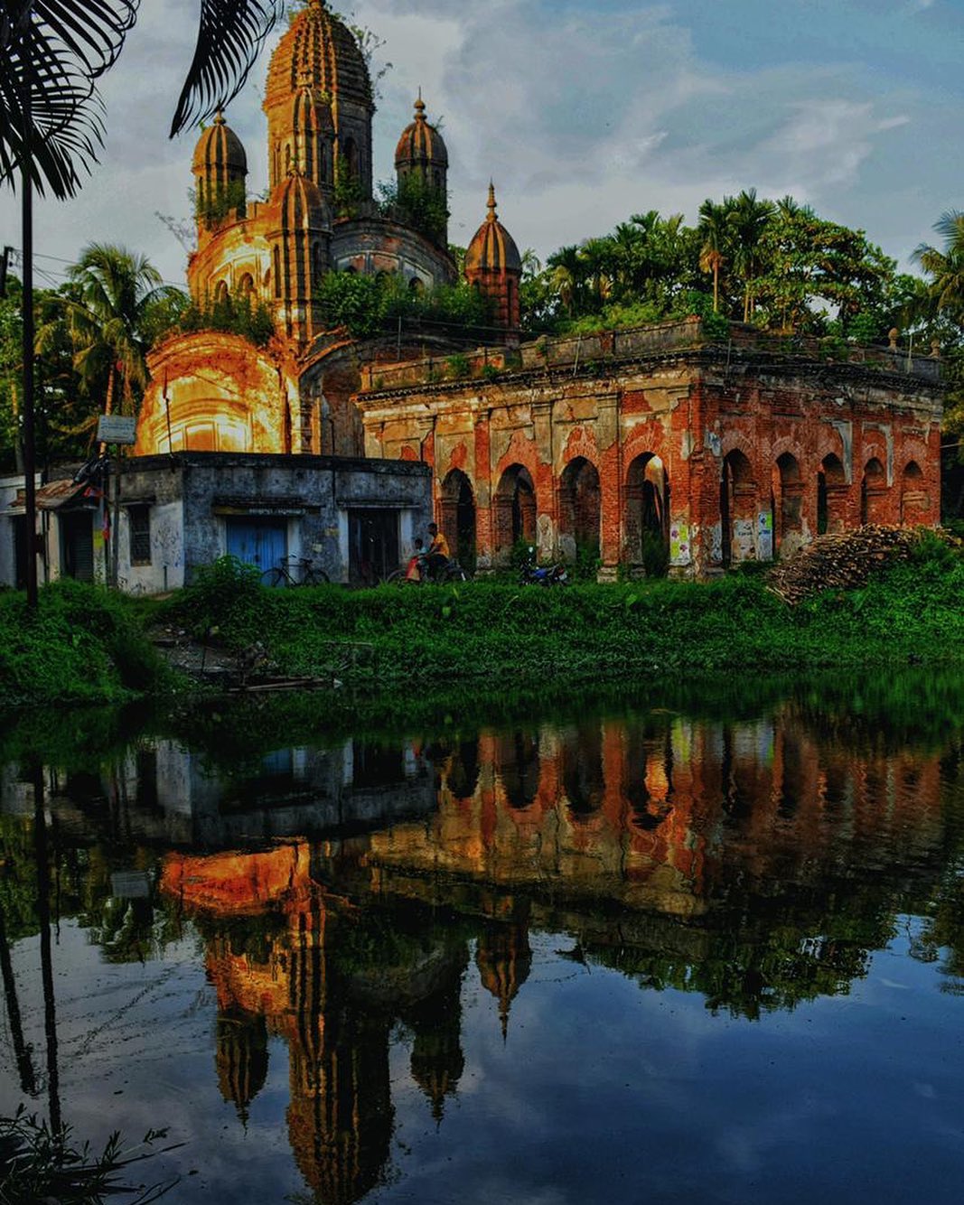 The Rajbari - ⁣•The Temple• A magnificent temple reflects into the pond ...