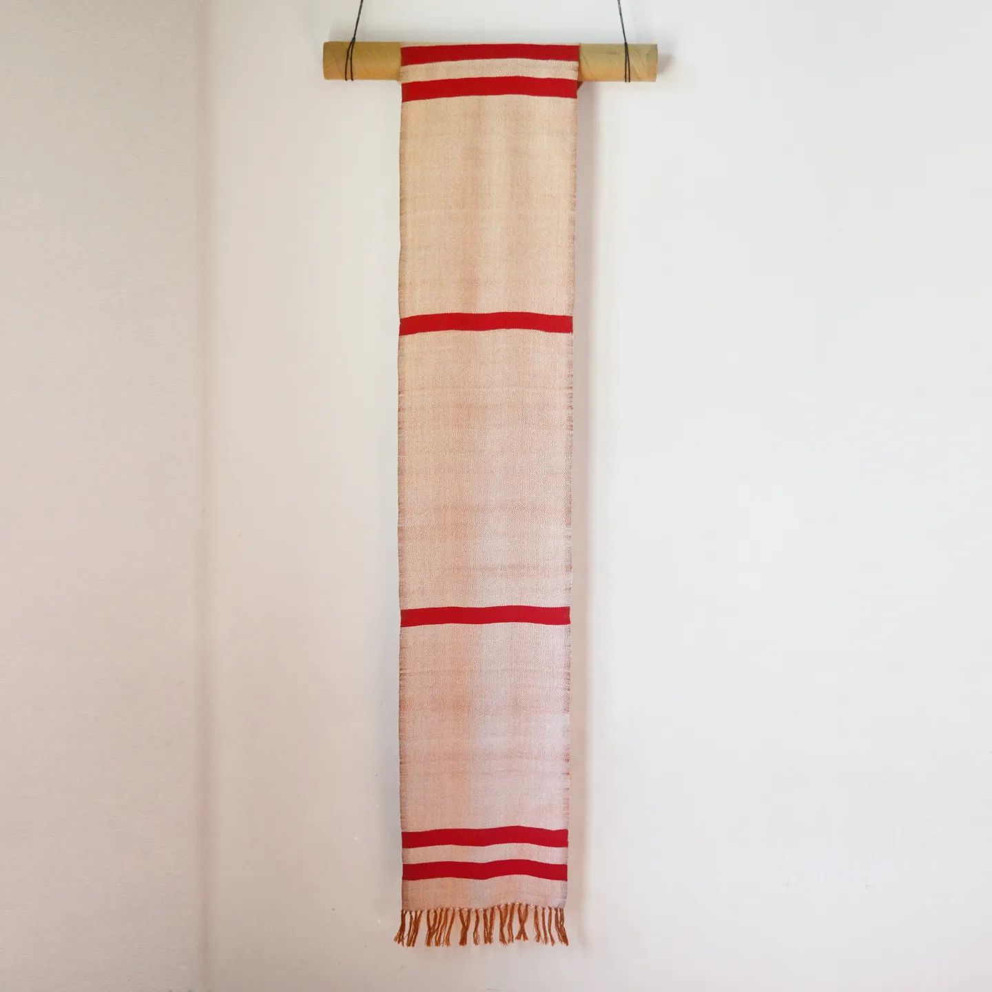 Dāk India - ' Surkh ' adorned with stripes in twill weave,...