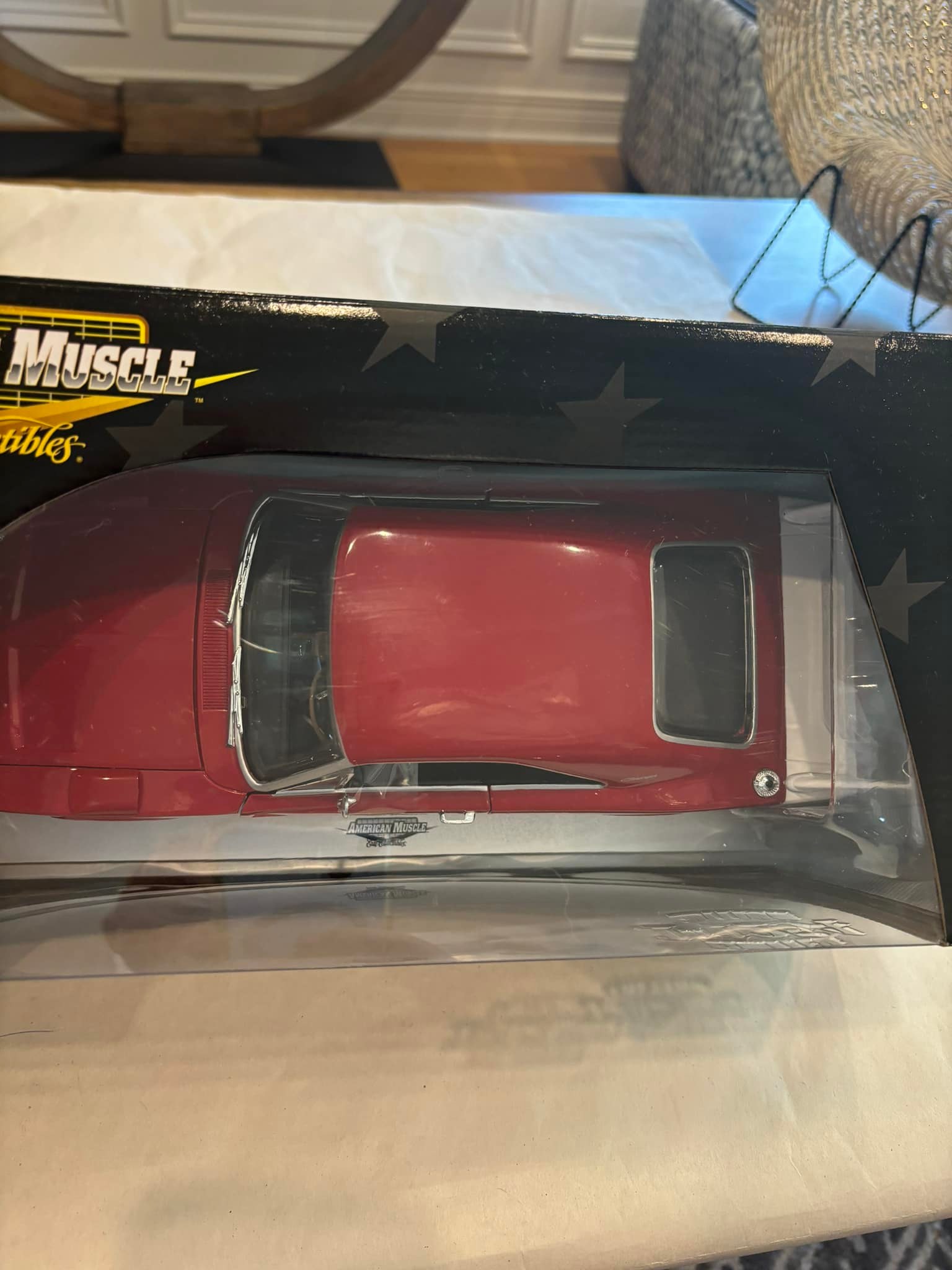 Collectible die-cast metal 1:18 scale model car from the Ertl
