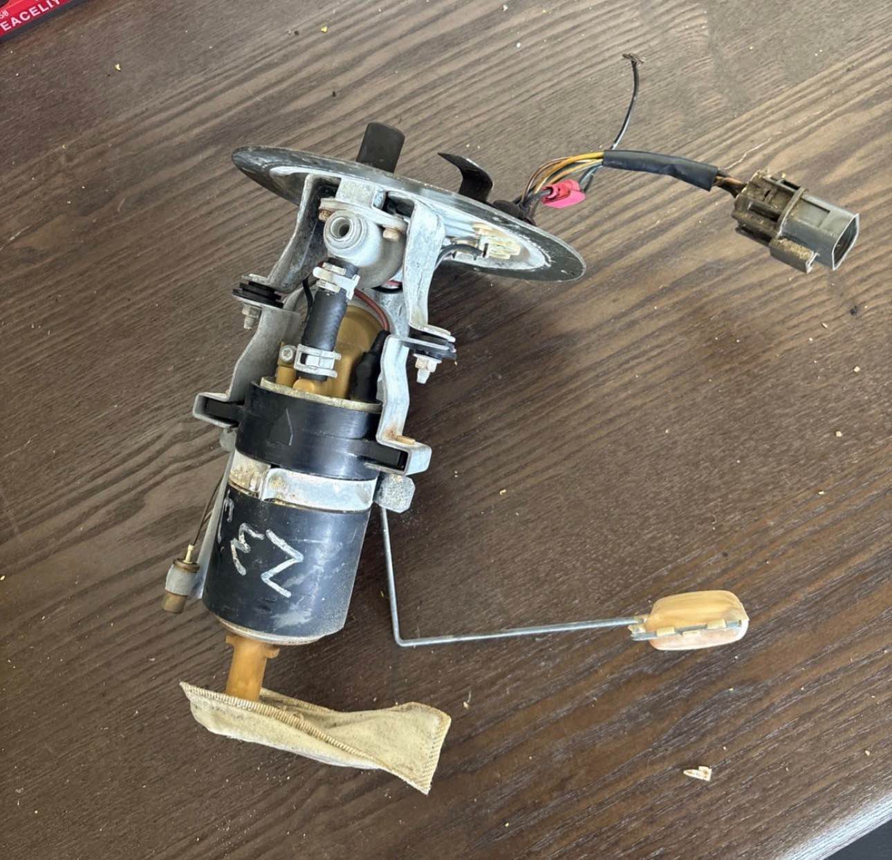 This listing includes a fuel pump assembly from a 2+2 300zx part