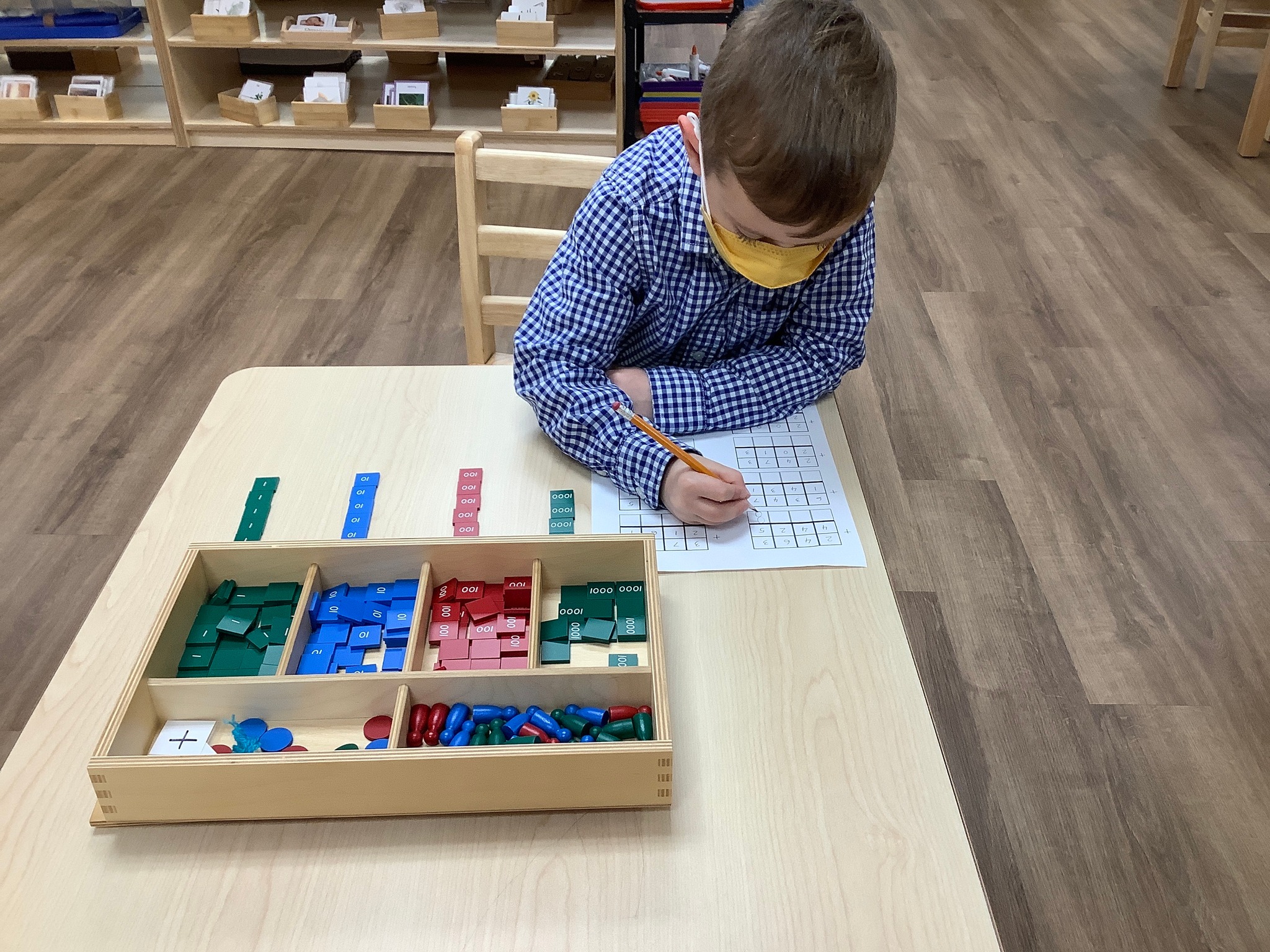 The stamp game:... - Guidepost Montessori at South Riding