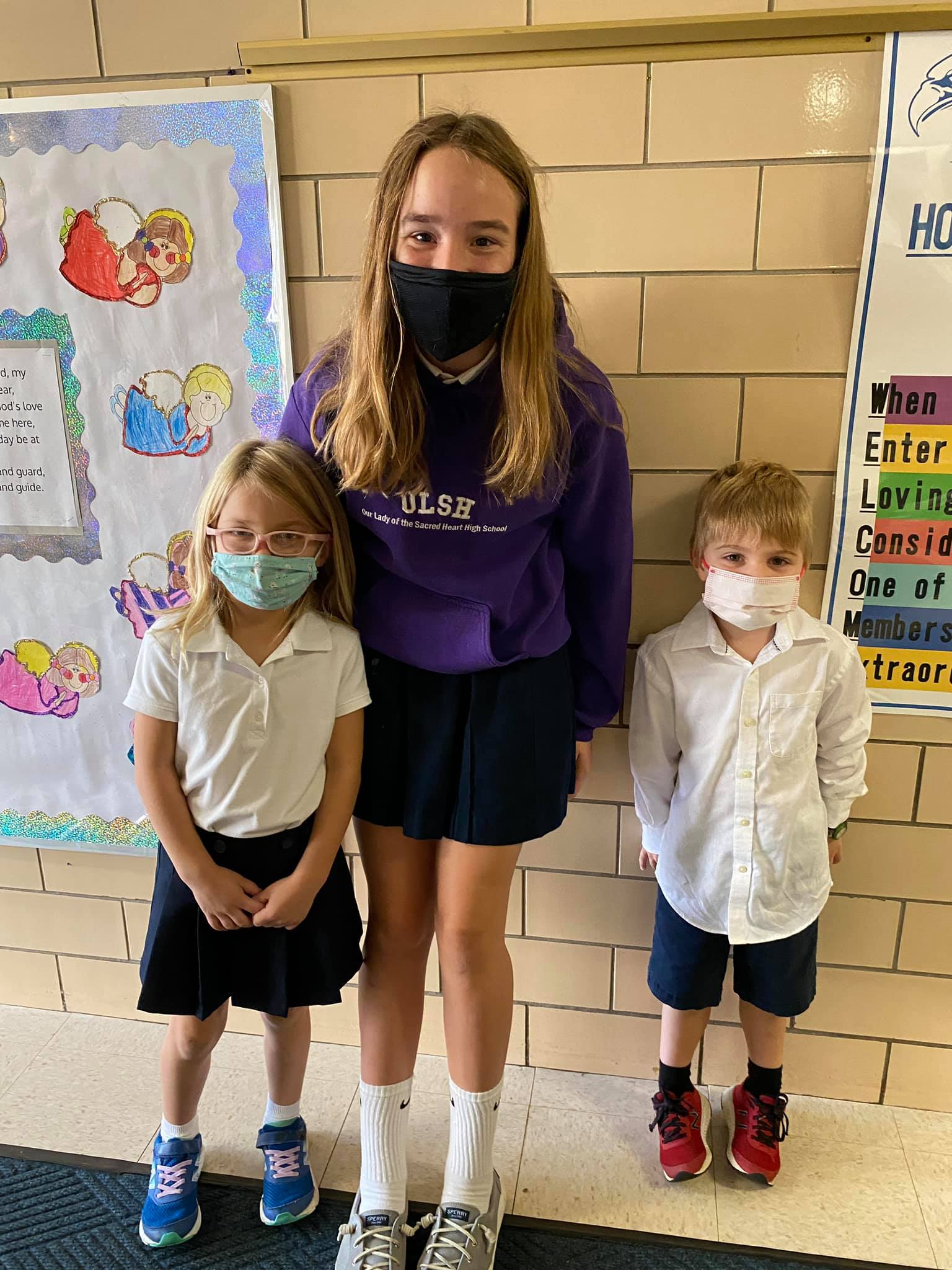Our 8th graders and Kindergarten... - Holy Cross Academy