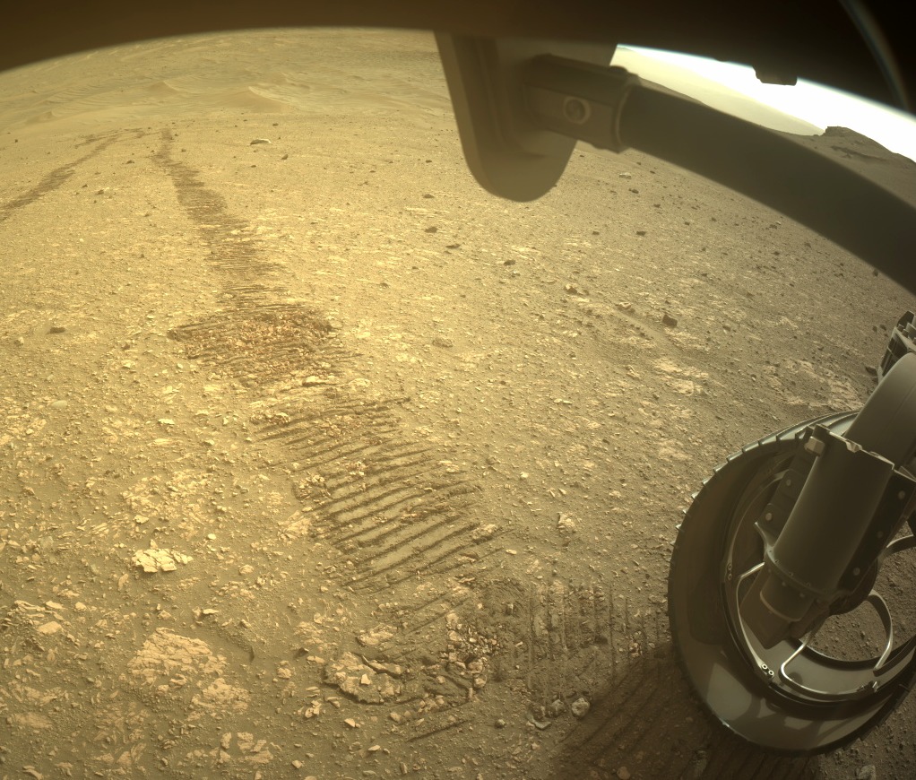 NASA - One of the Perseverance rover's wheels, as seen by a hazard ...