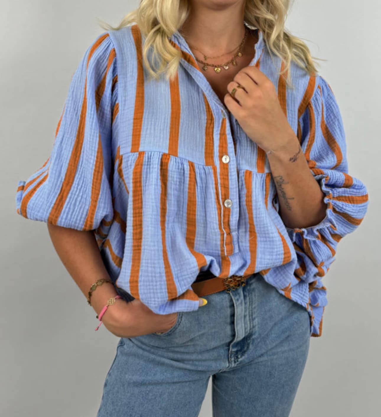 Next this sweet little top with mesh sleeves by designer Didier 