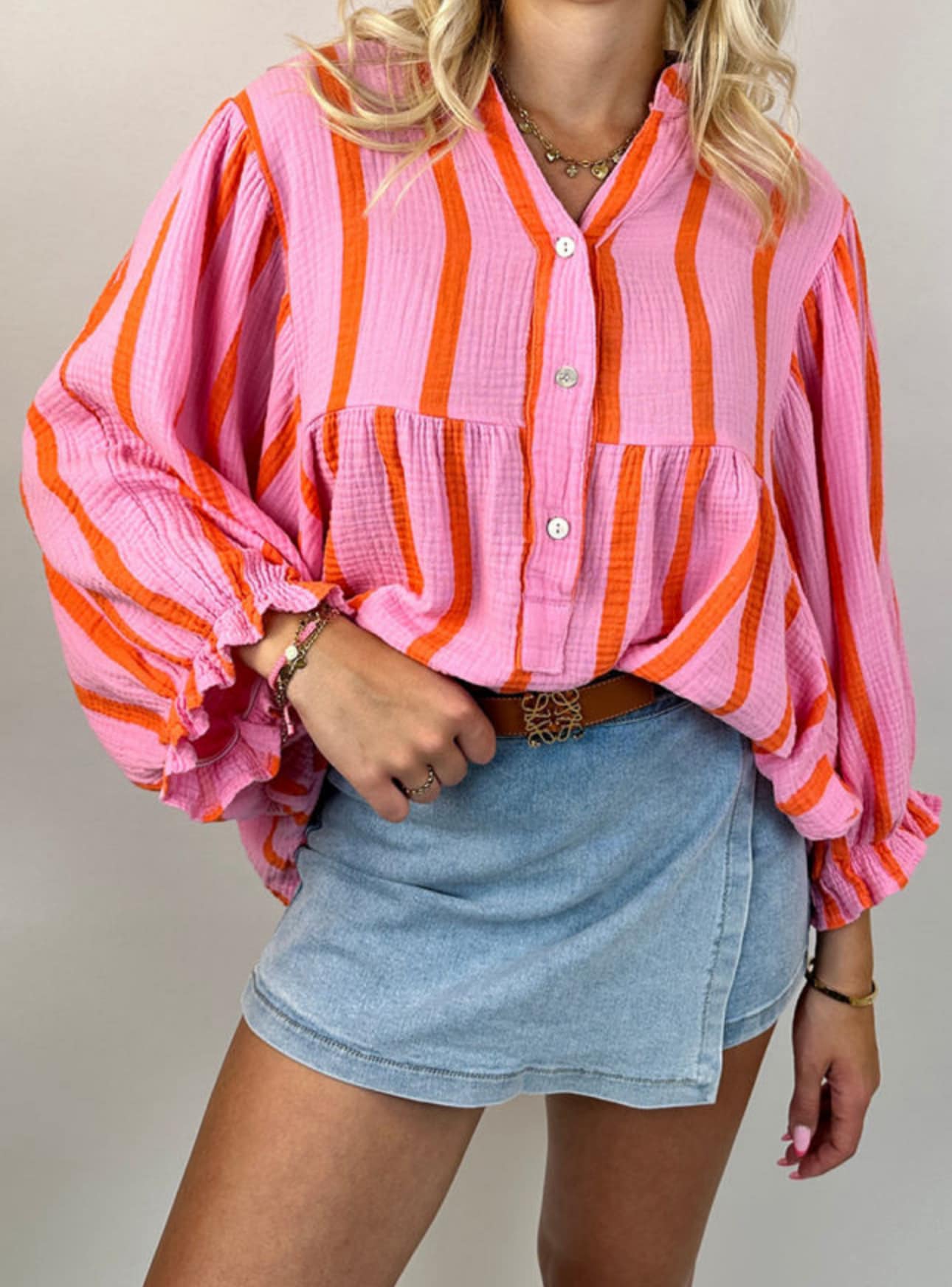 Next this sweet little top with mesh sleeves by designer Didier 