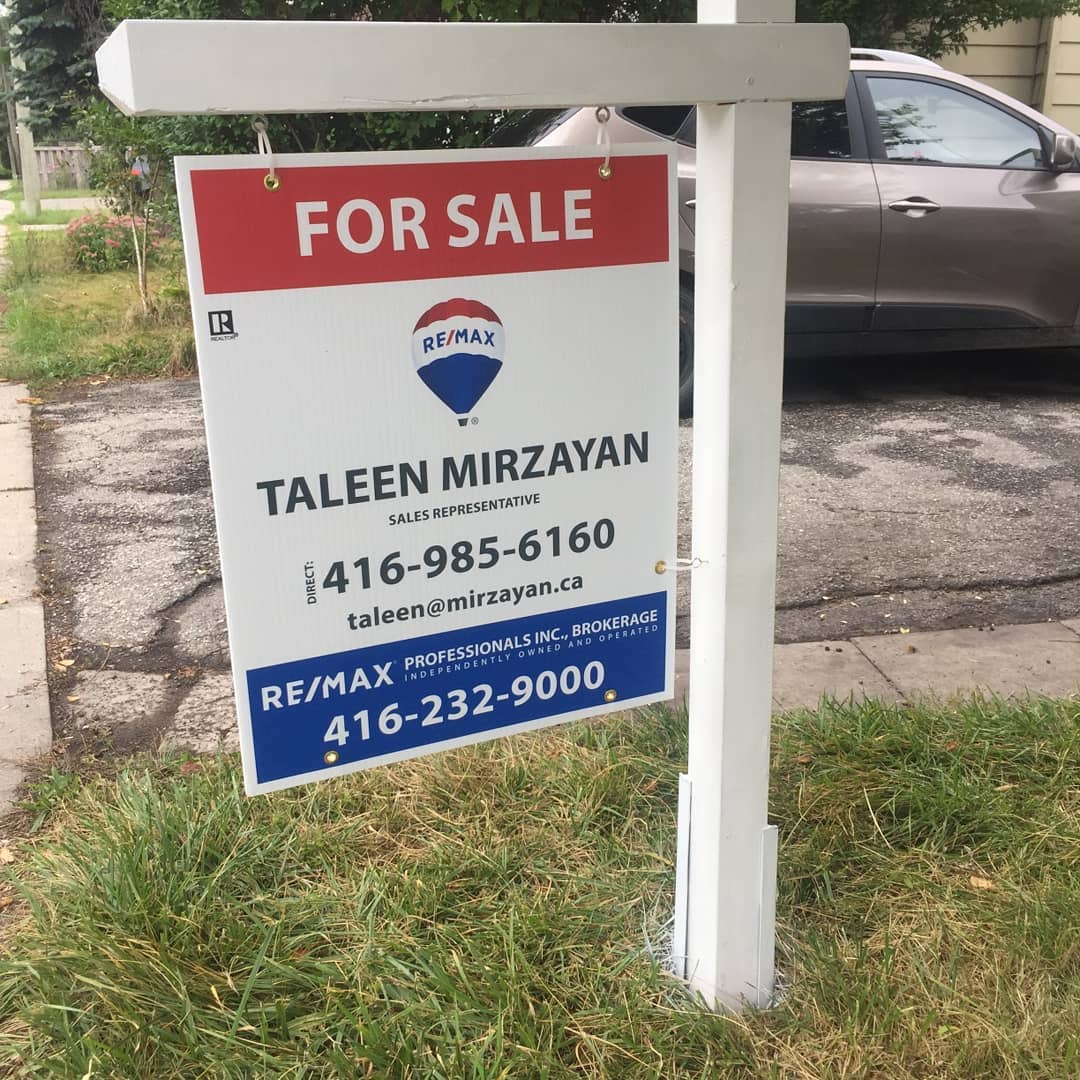 Trust Signs - A quaint little house with the perfect sign....