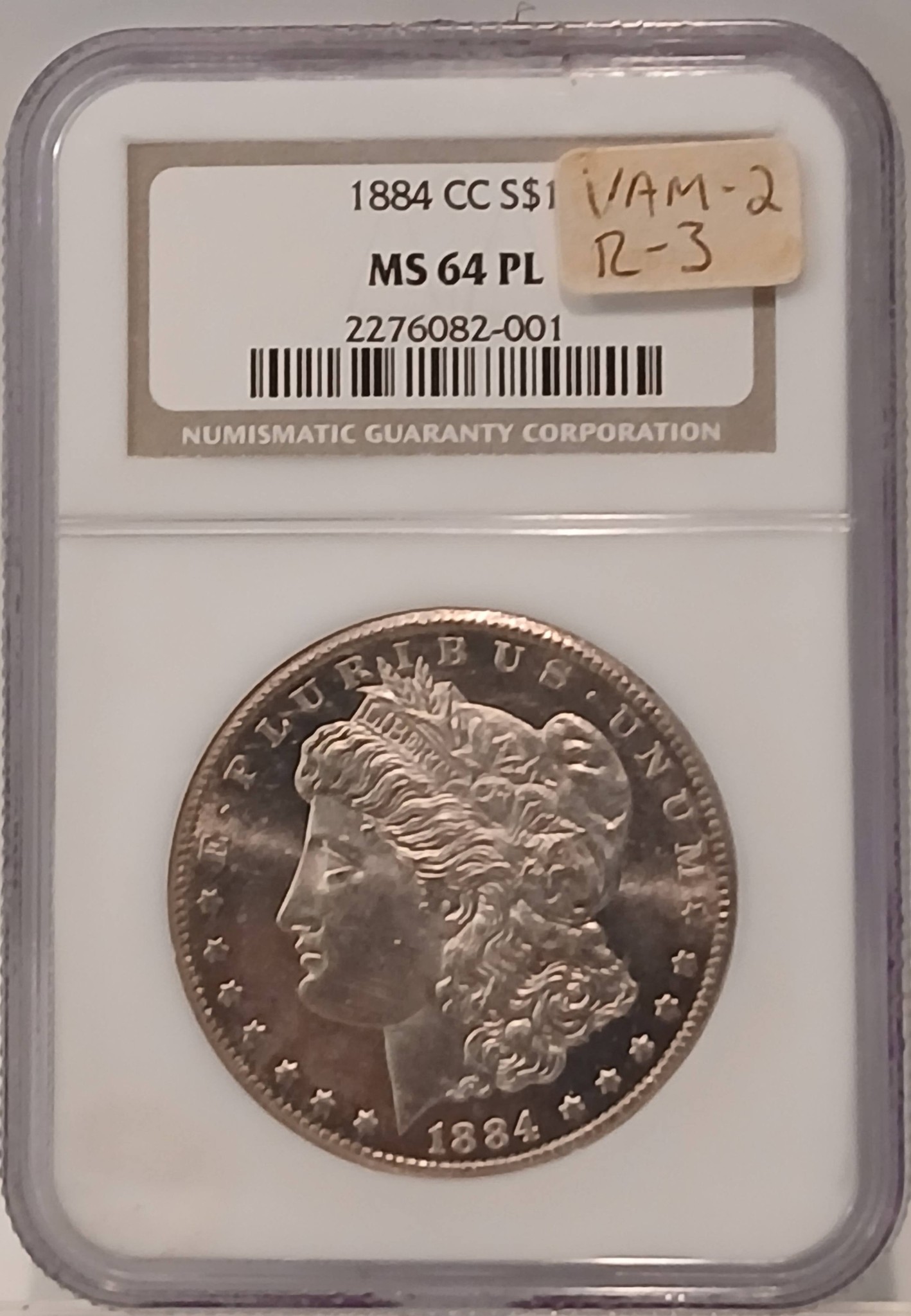 1884-CC Morgan Dollar graded MS 64 PL by Numismatic Guaranty