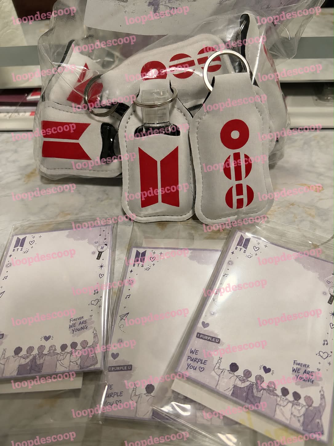 BTS-themed freebies for mail trade: keychains, hand sanitizer