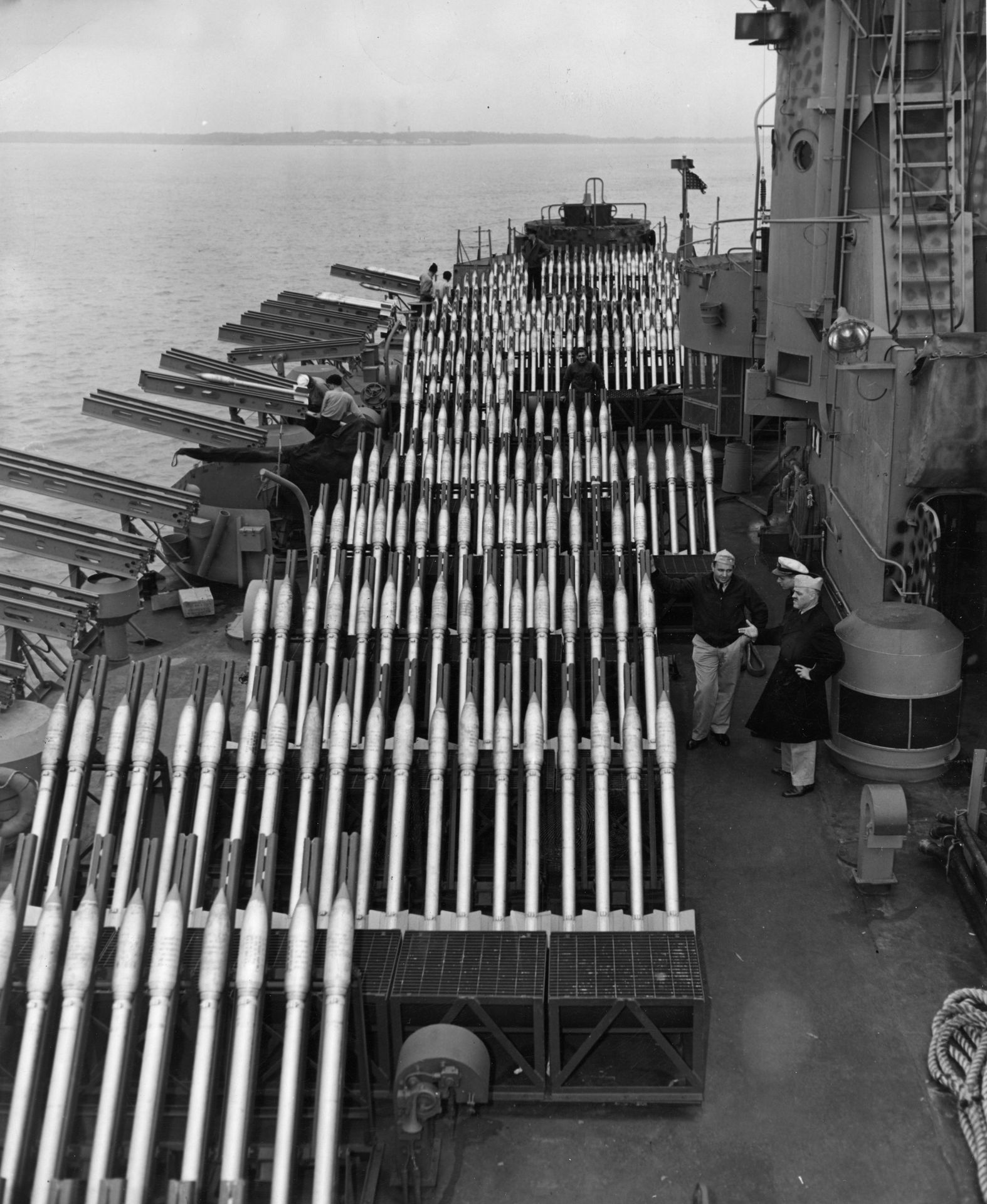 Masses of 5-inch rockets on the deck of... - MilitaryHistoria | Facebook
