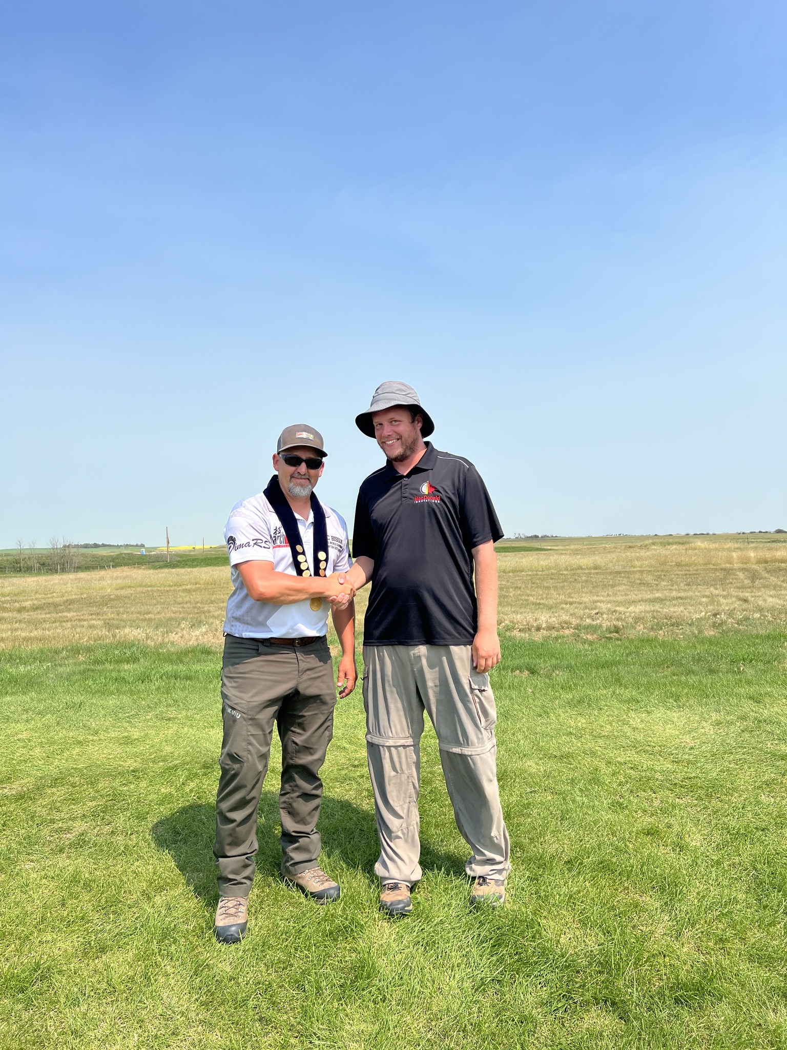 Dominion - Adam MacDonald presenting the sash for FTR to Eric Bisson ...