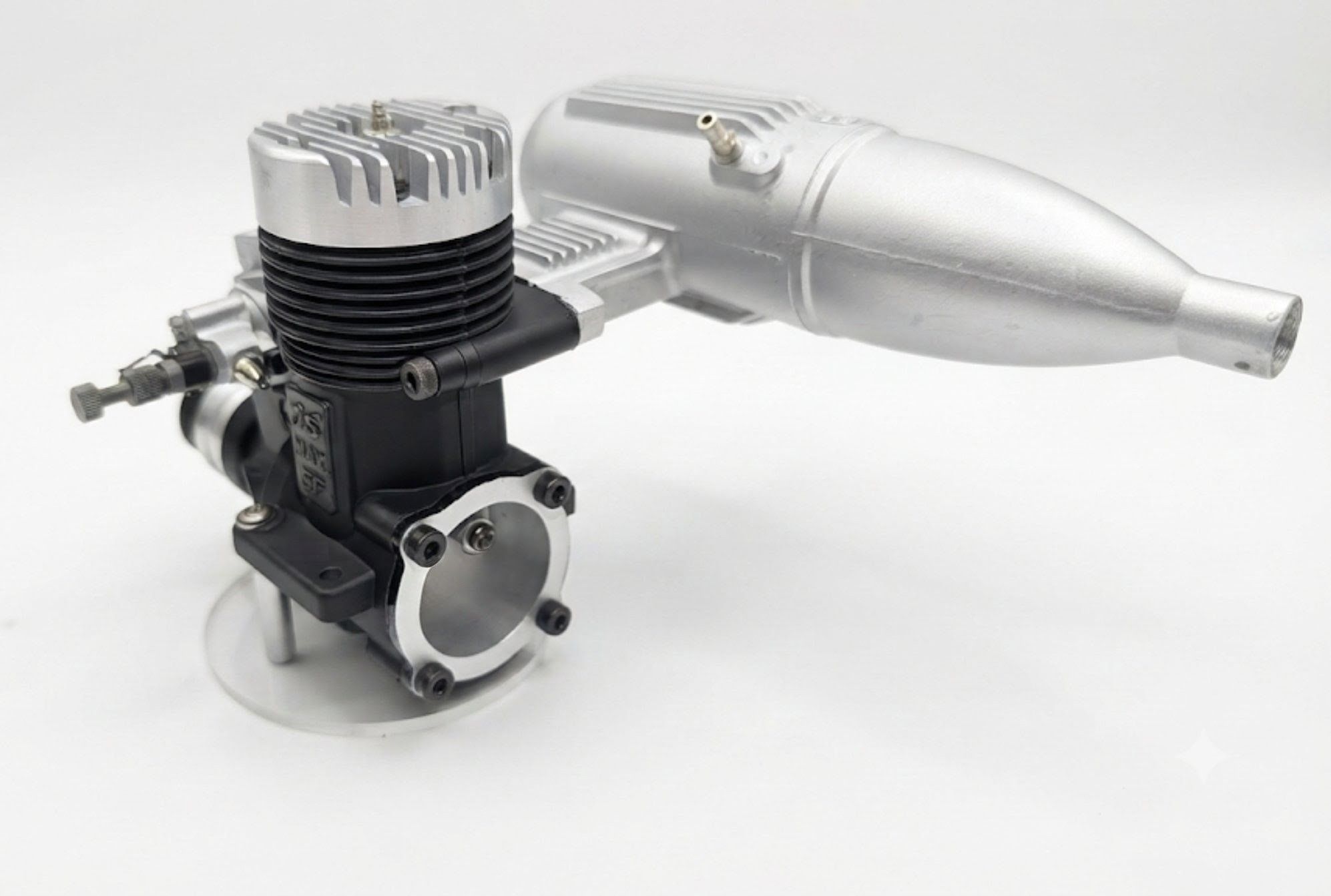 This is a beautiful O.S. MAX 61 VR RC with a 7G carburetor (?) and
