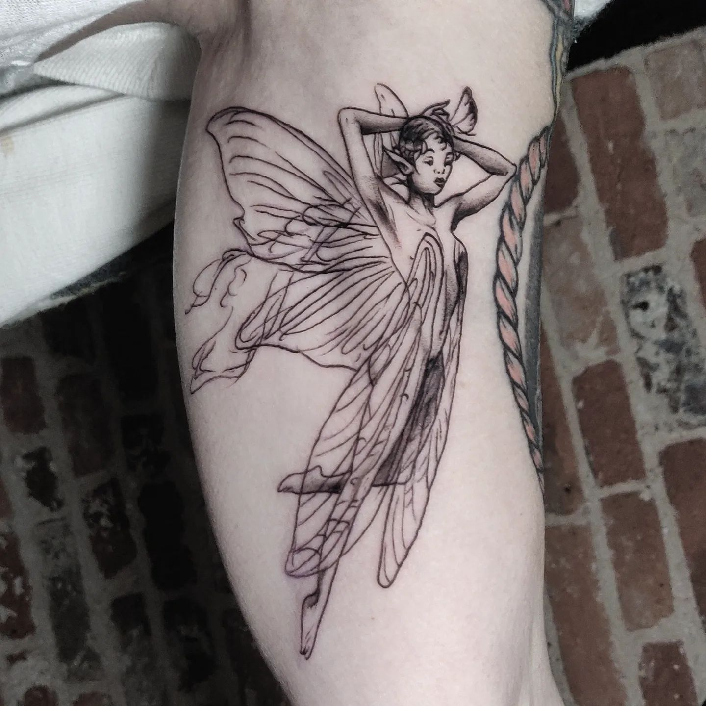 Dreamy realistic fairy tattoo by Wrexham Ink