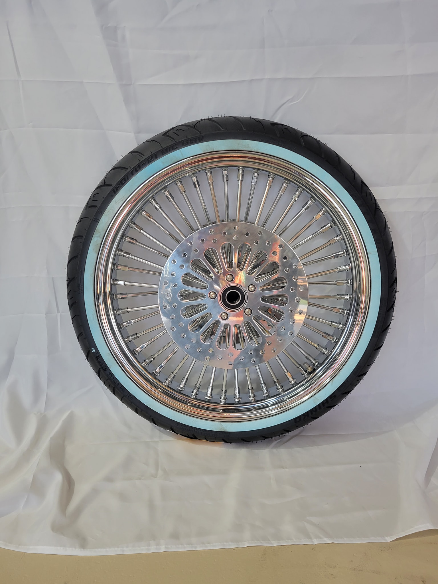 Combo cast laced 21 in. front wheel and 18 inch rear wheel for sale