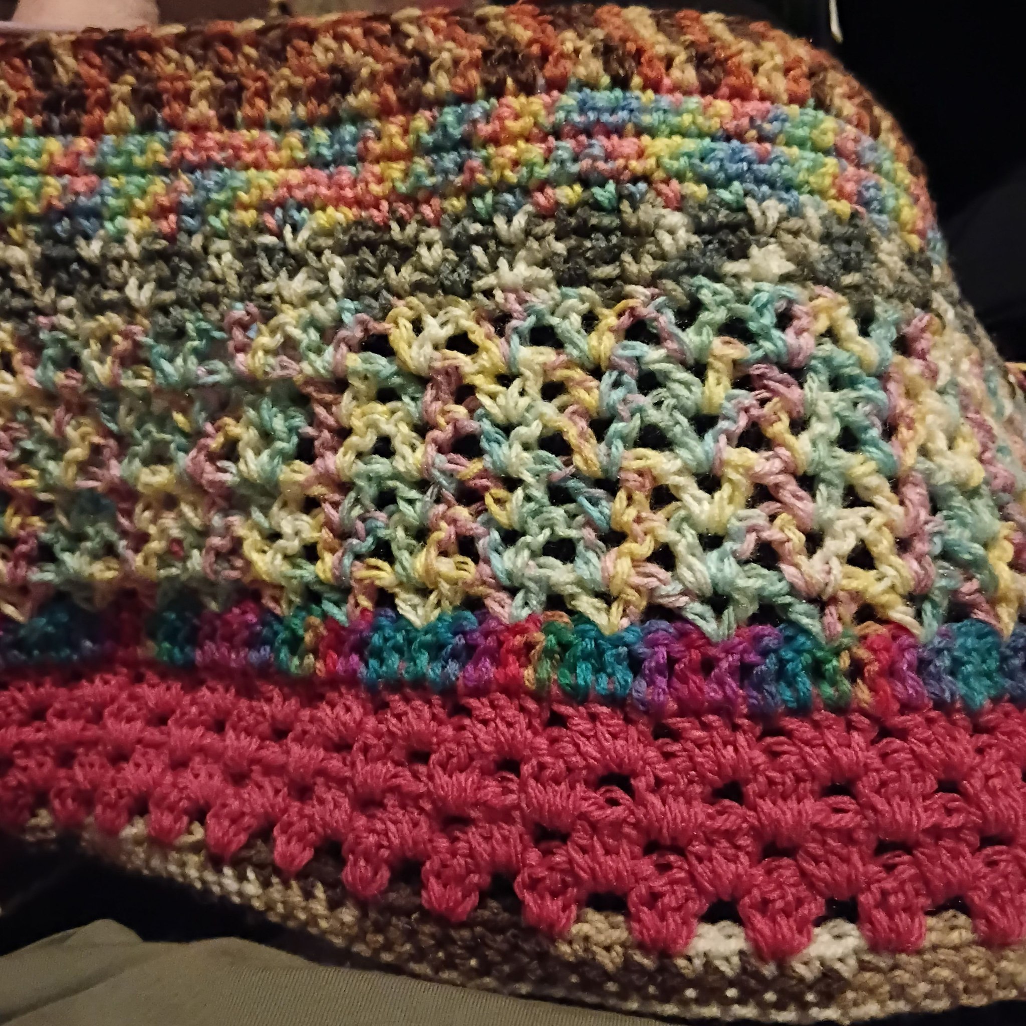 Chaos knitting sweater with random colors and improvised pattern