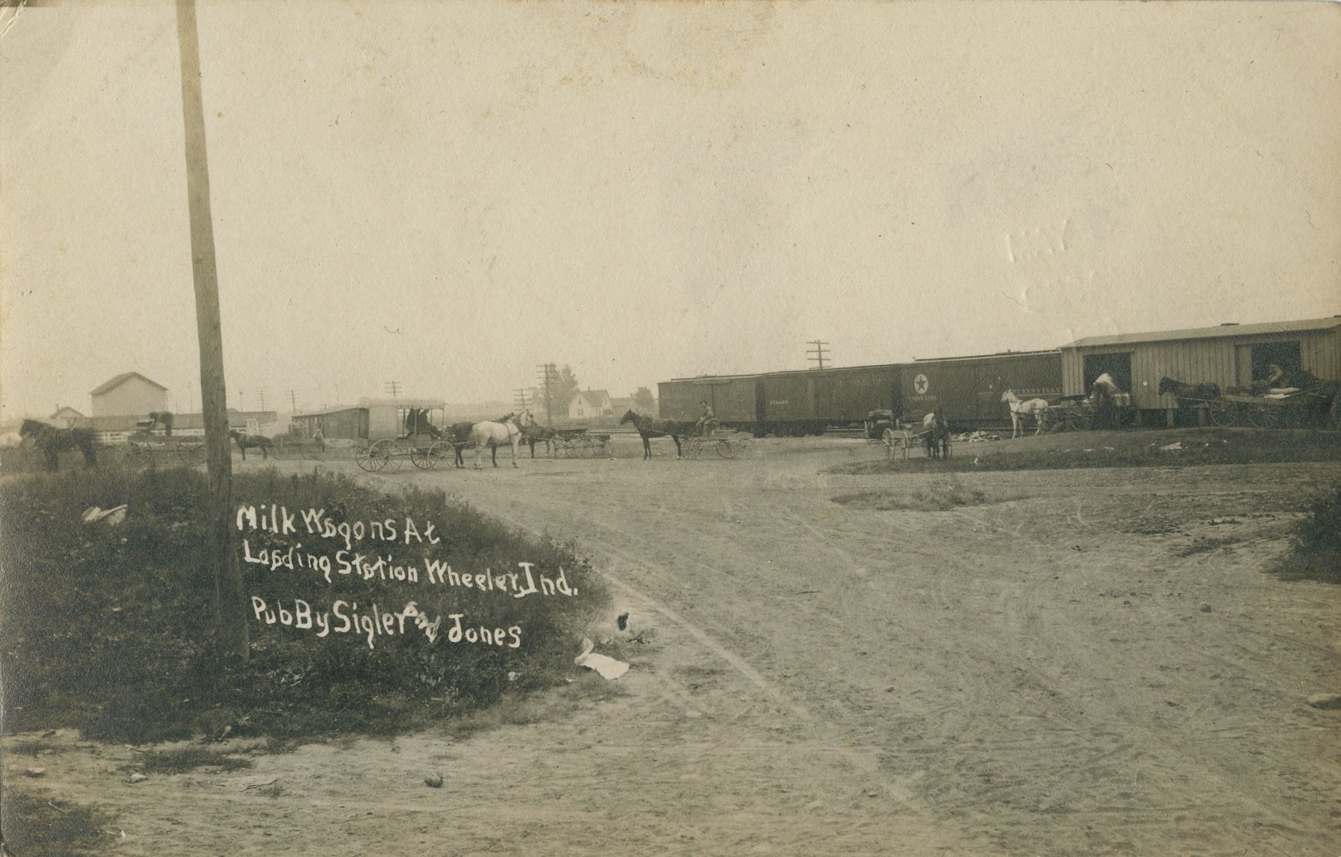 Porter - Postcard image of milk wagons at loading station at Wheeler ...