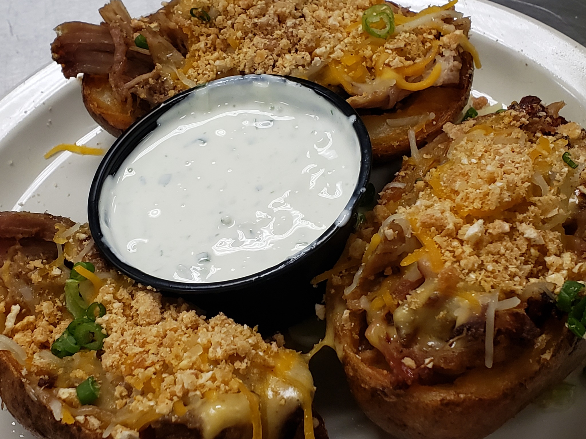 Porky Potato Skins at Wister’s Barbecue. Deep fried potato skins ...