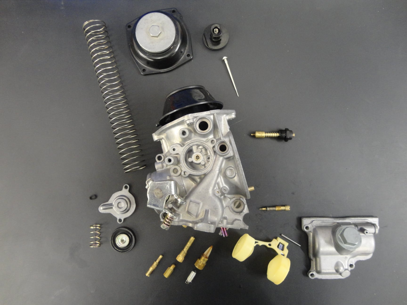 Honda RC30 CV carb body. - GT Performance Engineering