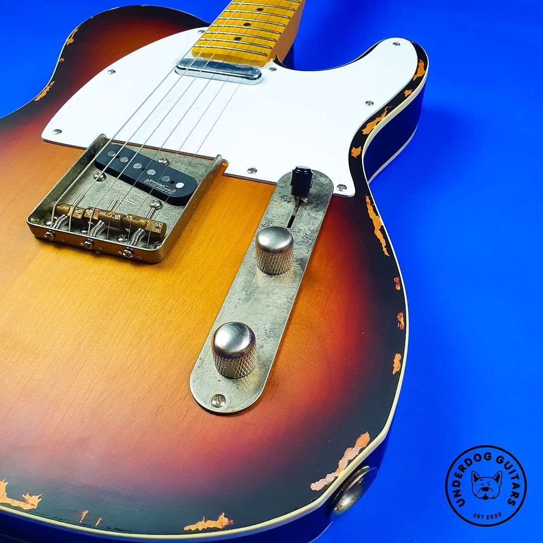 Vintage Icon V59 electric guitar with distressed sunburst finish
