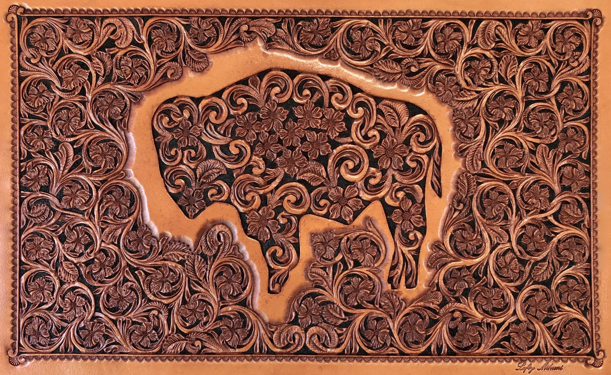 Master leather carving exhibit at The Brinton Museum