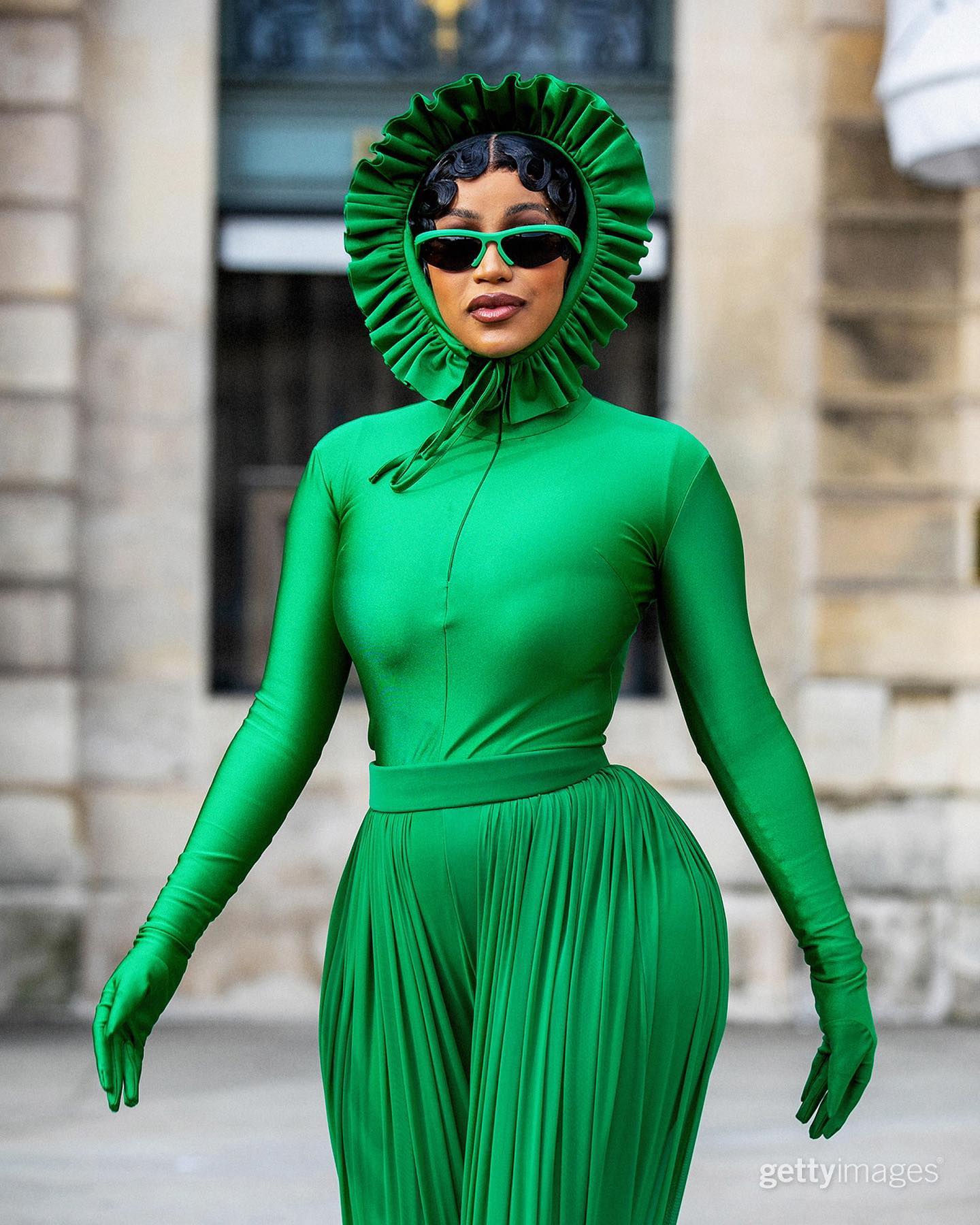 cardi b green dress has been stealing the show with her bold Paris Fashion Week outfits! 😍⁠⁠ _⁠⁠ She was spotted this week, often with Offset by her side, wearing two Richard Quinn recomm_dr3494