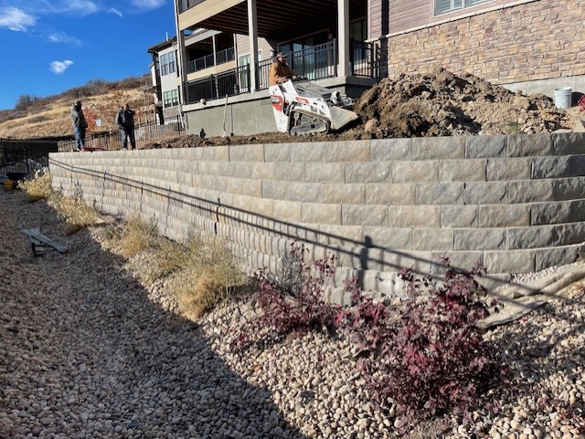 Creating a beautiful stone... - Ridgeline Services & Scapes