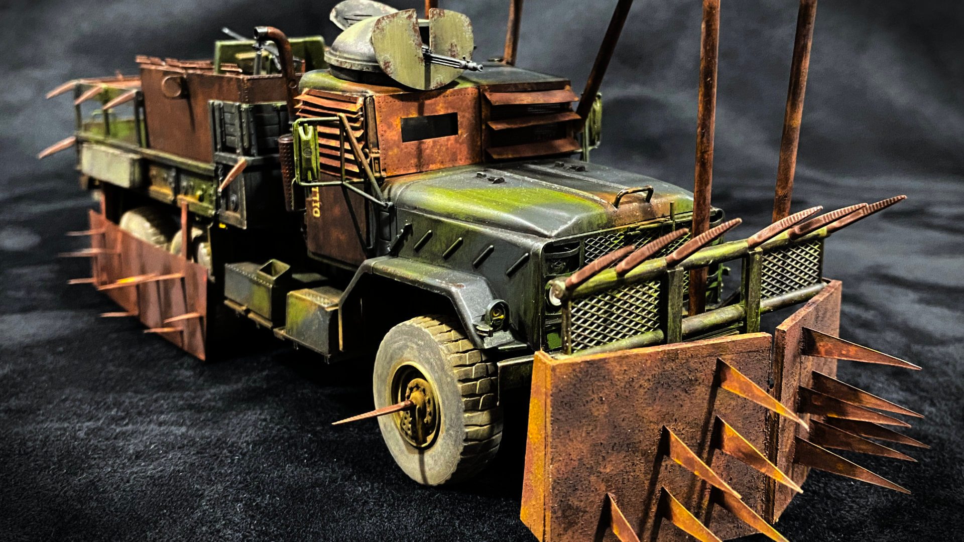 Scale model of M923 'Hillbilly' gun truck in zombie apocalypse diorama