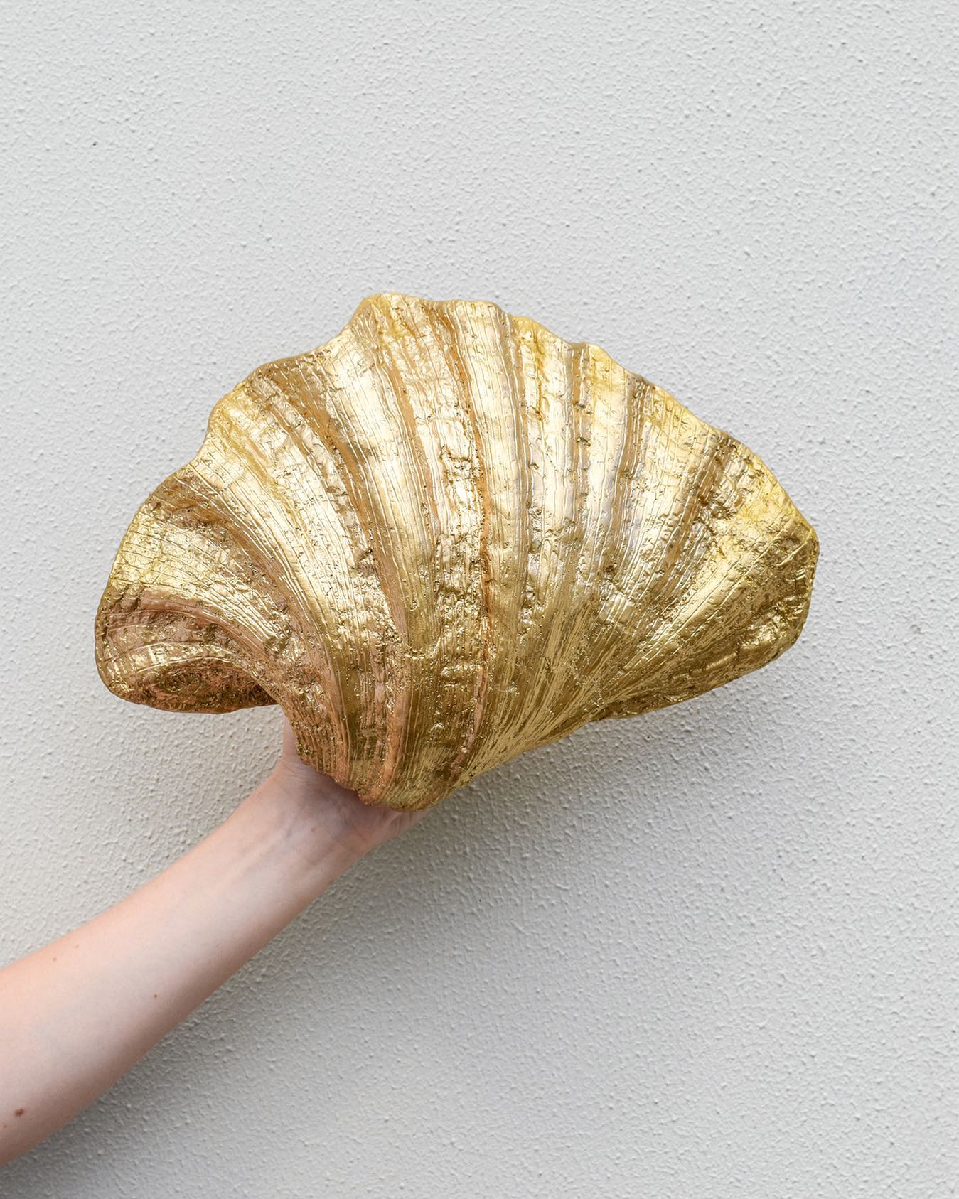 The ‘Gold Shell Wall Light’ boasting... - Lighting Collective