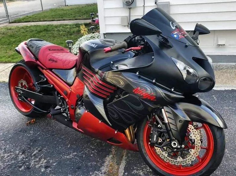 He's got this beautiful ZX-14 strapped down tight!