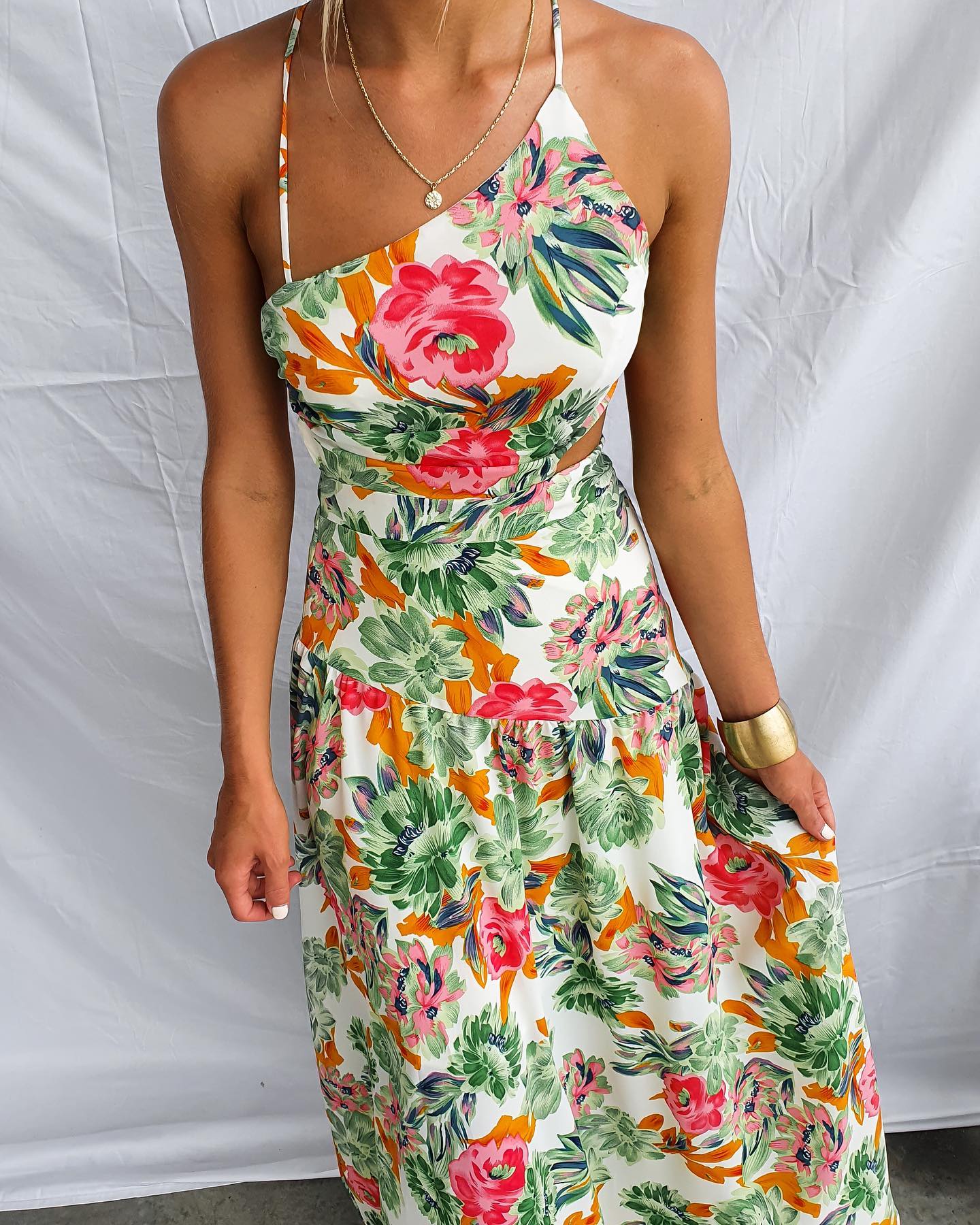 We can't get enough of our new Iris Asymmetrical Maxi Dress 🤍