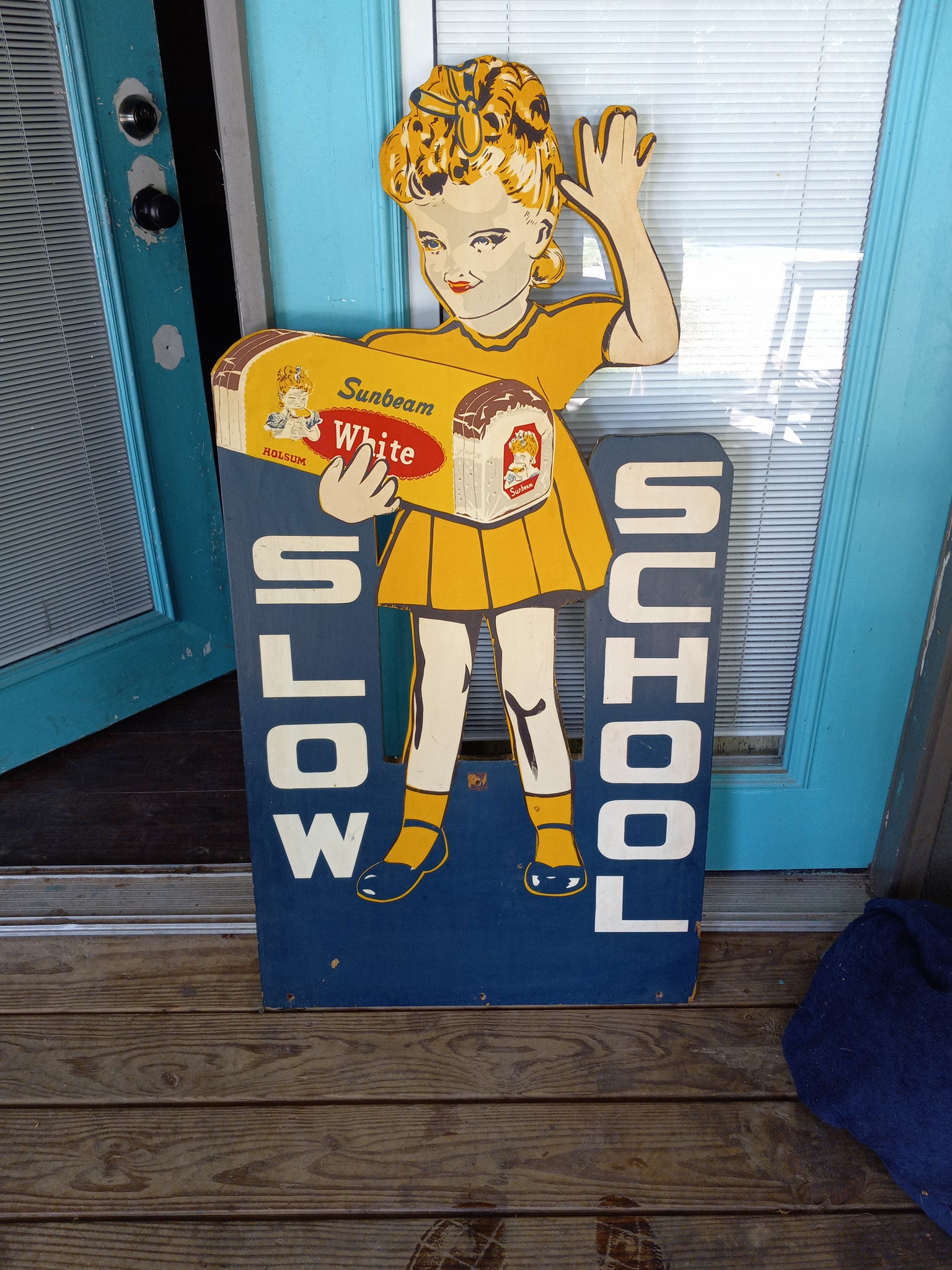 Vintage Sunbeam bread advertisement sign