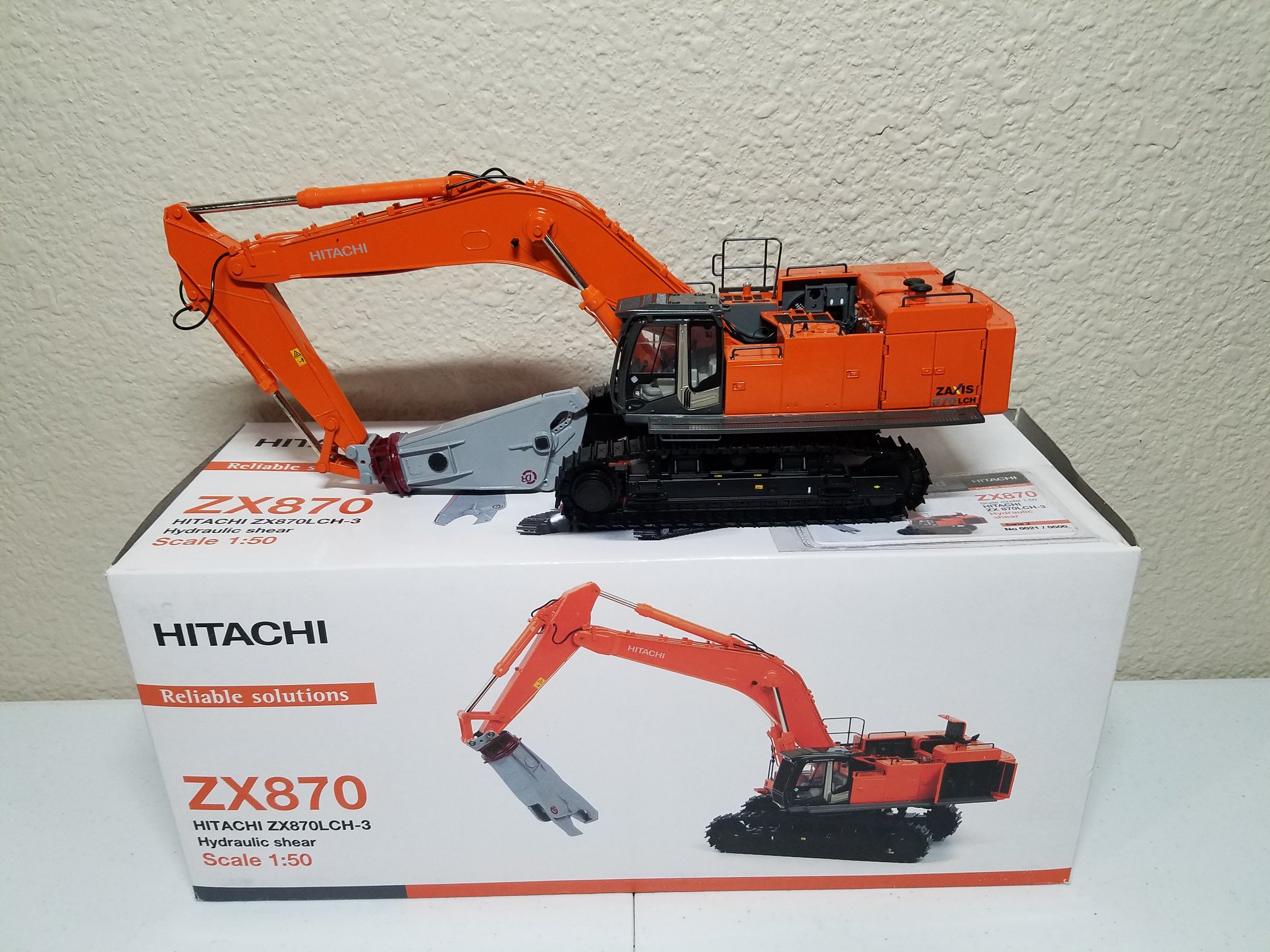 Hitachi ZX870 scale models for sale with zinc rot damage