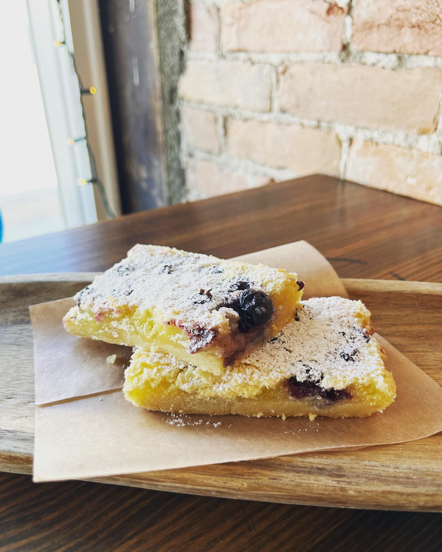 Num num num. lemon blueberry bars in... - Bricktown Bakery