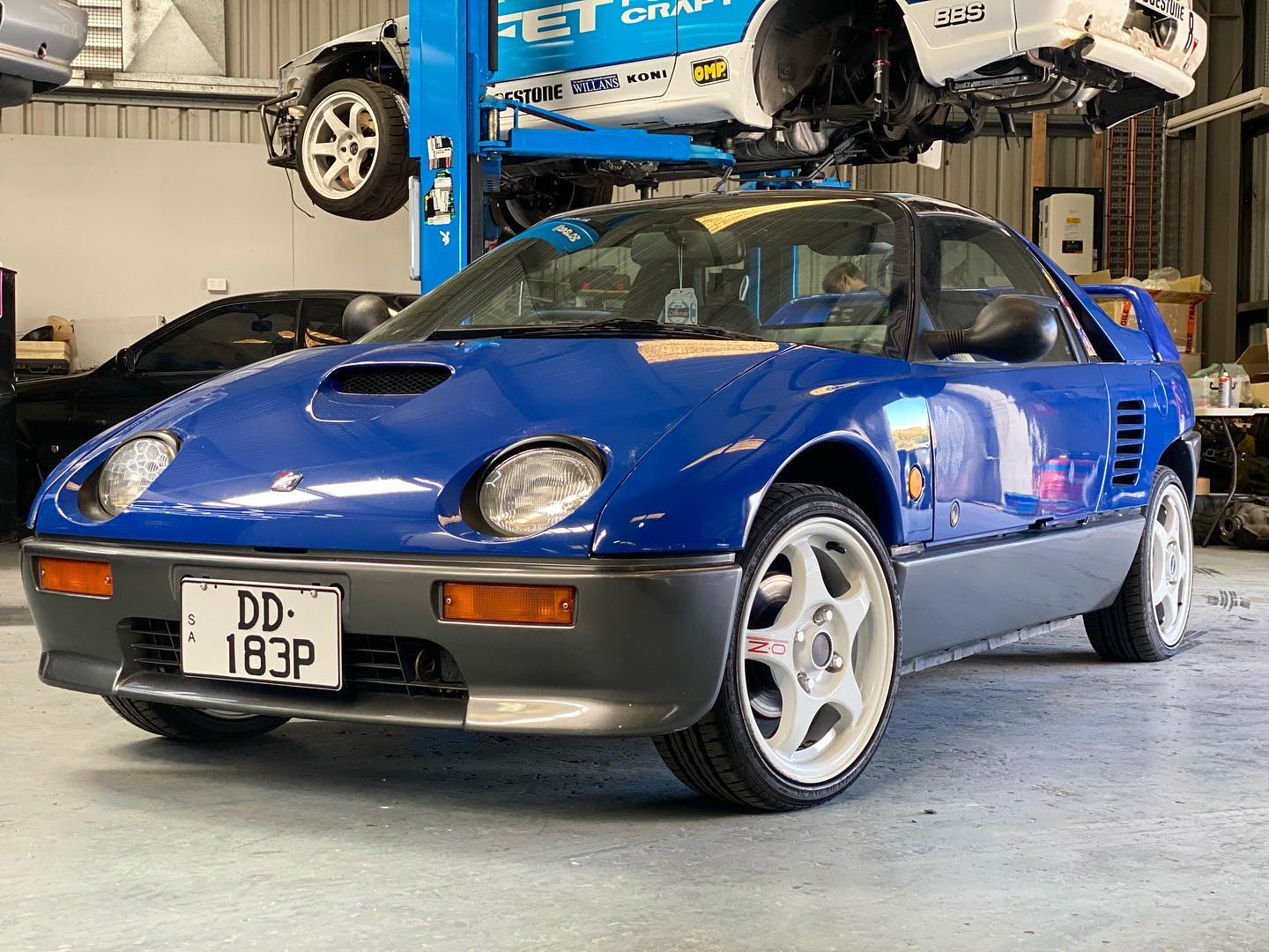Mazda AZ1 with a Comical Ford RS200 Evo Bodykit