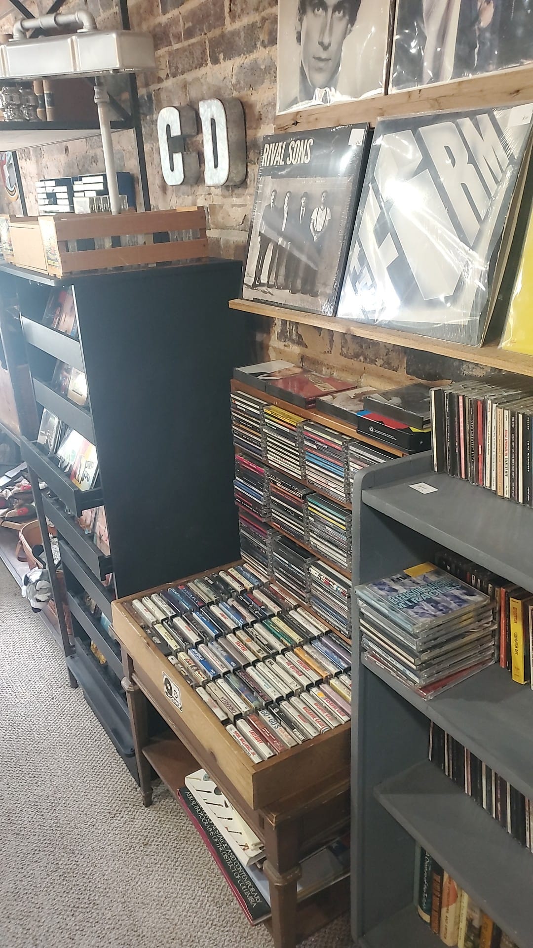Magnetic tape storage for CDs in steel box