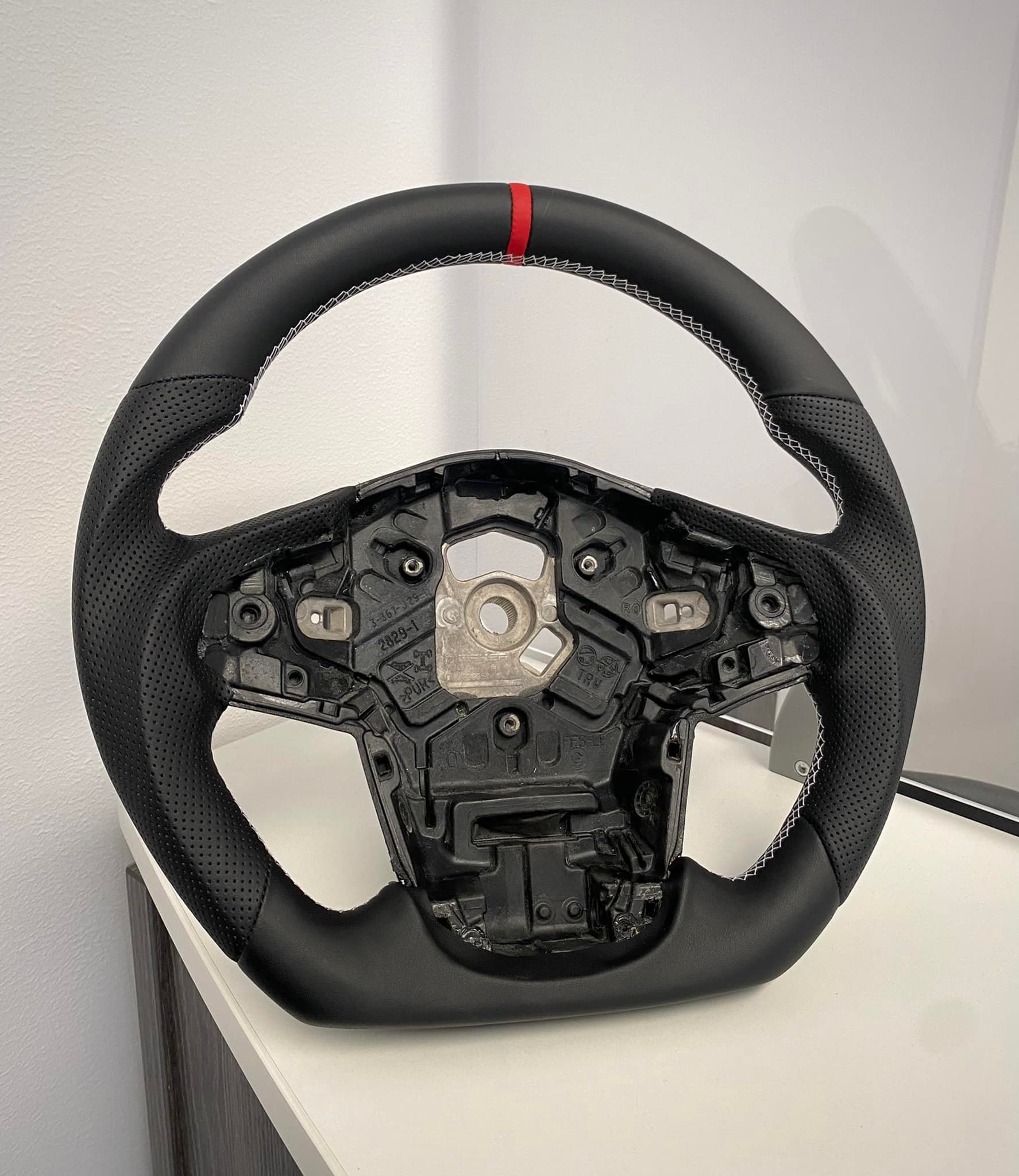 Our new Slasher Edition steering wheel in black suede with gold