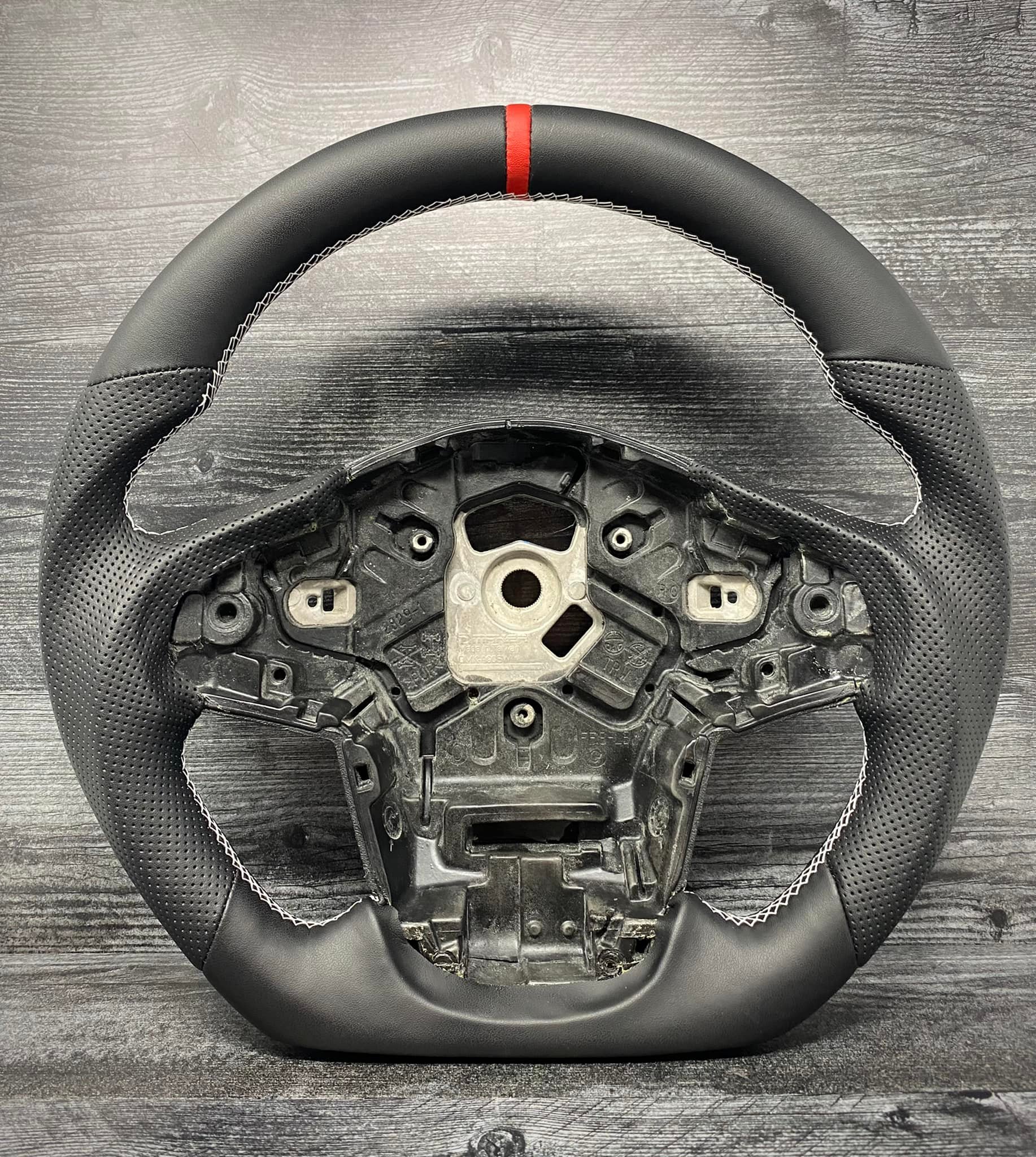 Our new Slasher Edition steering wheel in black suede with gold