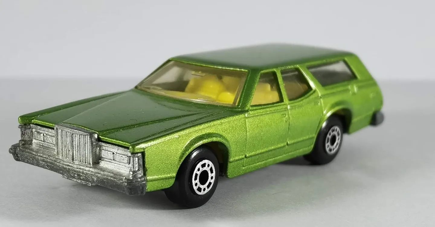 Matchbox no. 74 Cougar Villager models in blue and green
