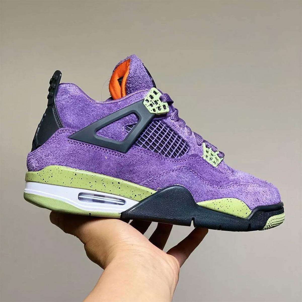 Black/Court Purple Air Jordan 4 just dropped on SNKRS App.