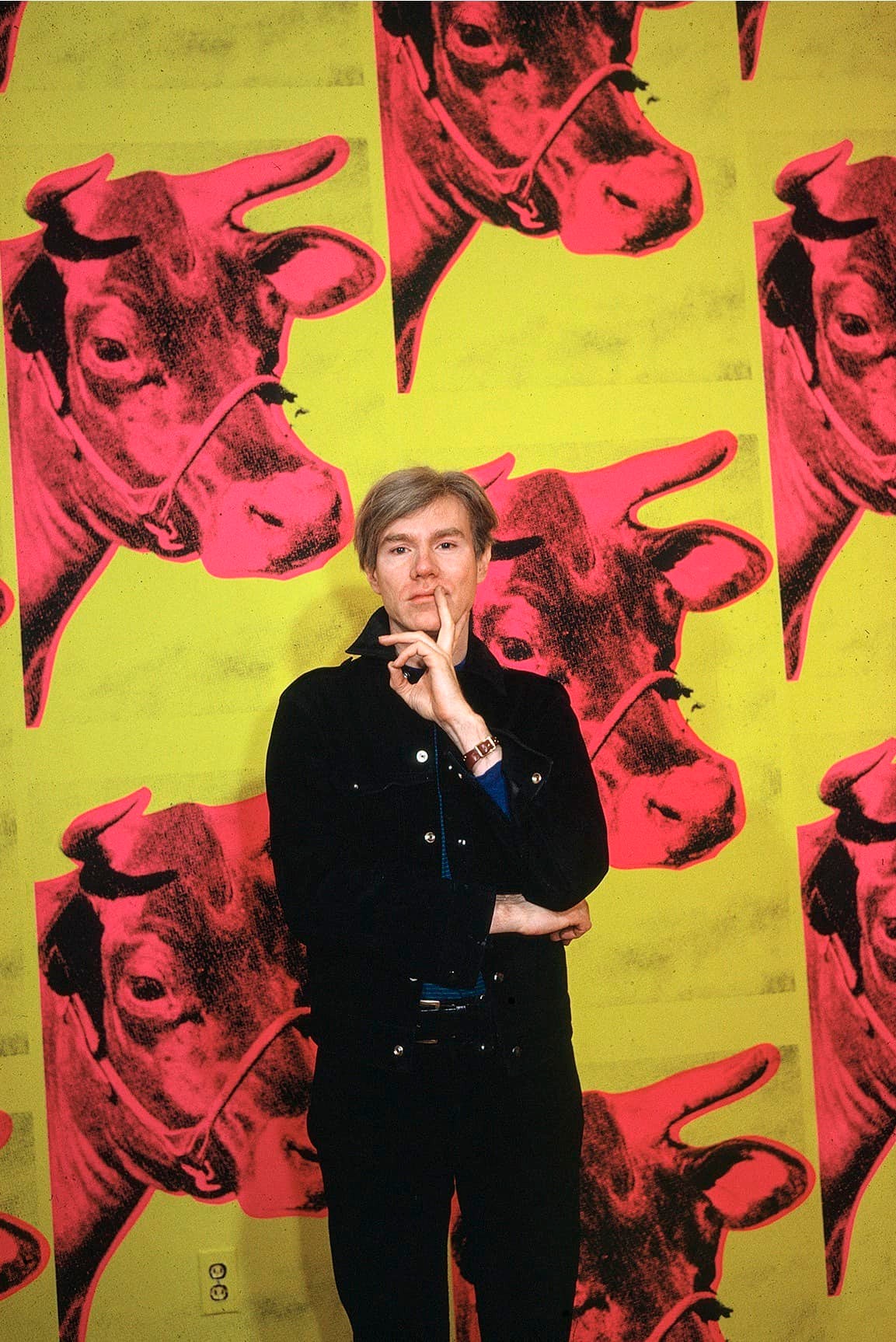 Andy Warhol in front of Cow wallpaper photo by Steve Schapiro, 1965.