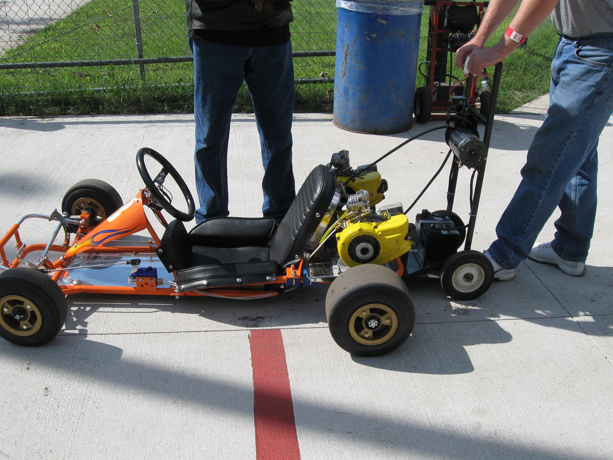 Vintage racing cart with twin McCulloch MC-10's at local car parts