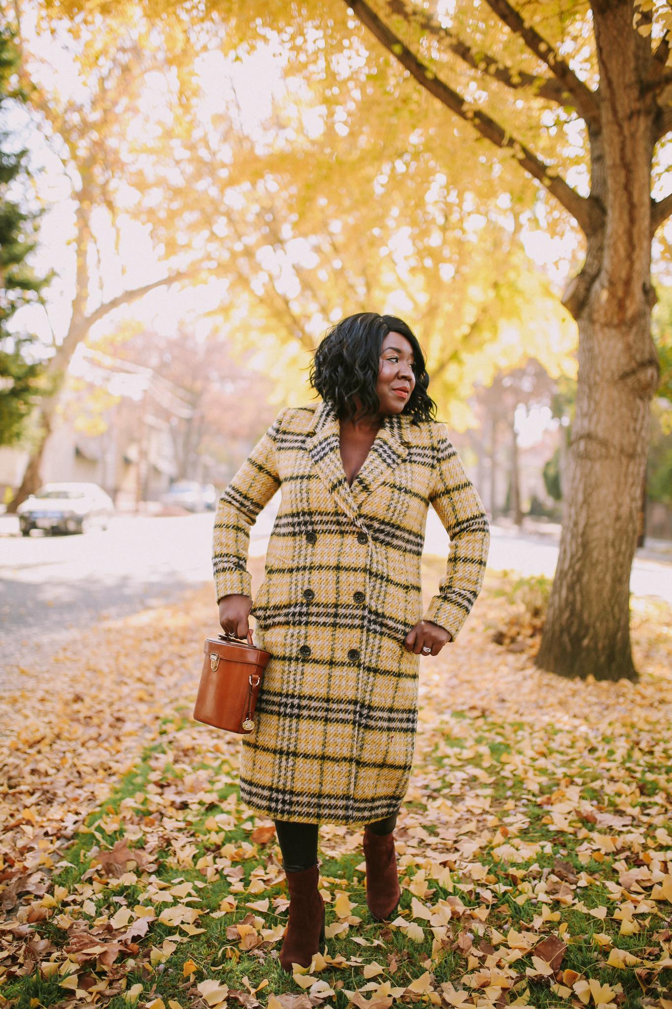 Classic check. The Plaid Coat, available in boutiques and online