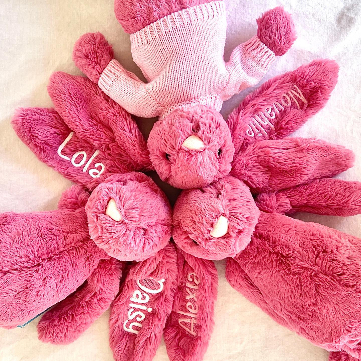 Cerise Jellycat Bashful bunny. Show here embroidered in pink and
