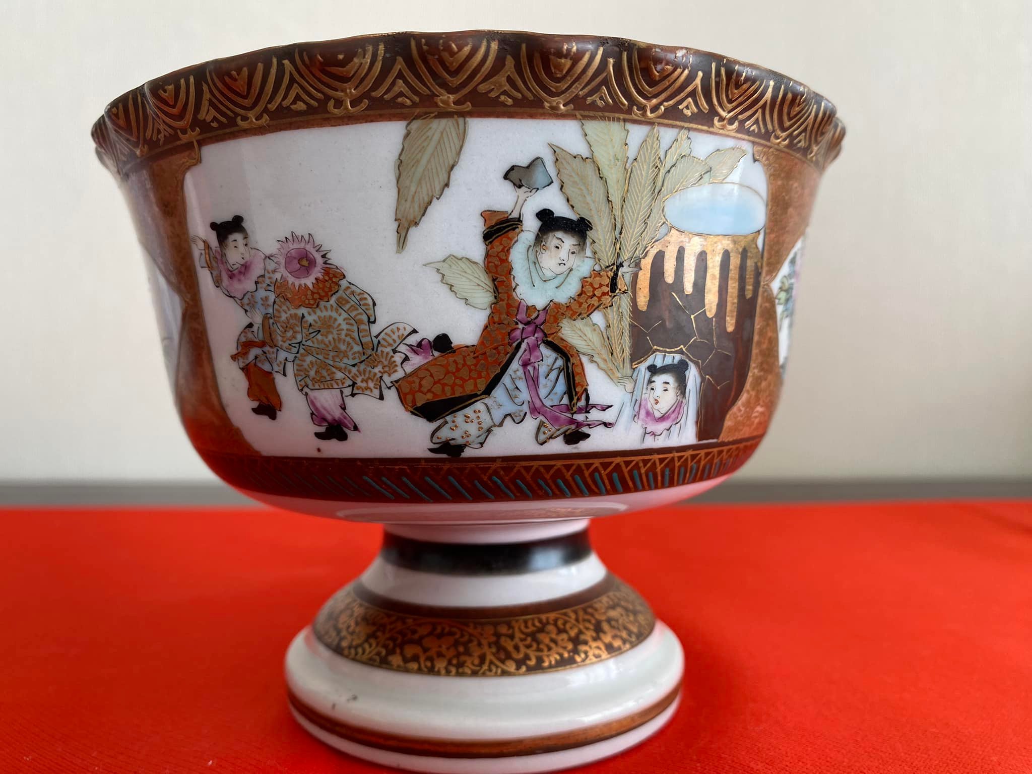Who is the author of this hand-painted Kutani fish bowl?