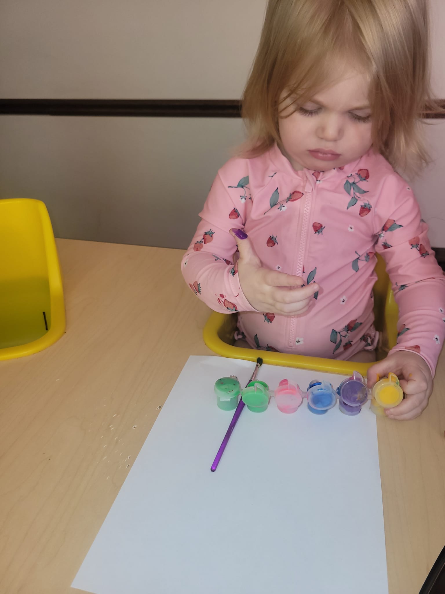 Explora Daycare - The kids are painting with colorful...