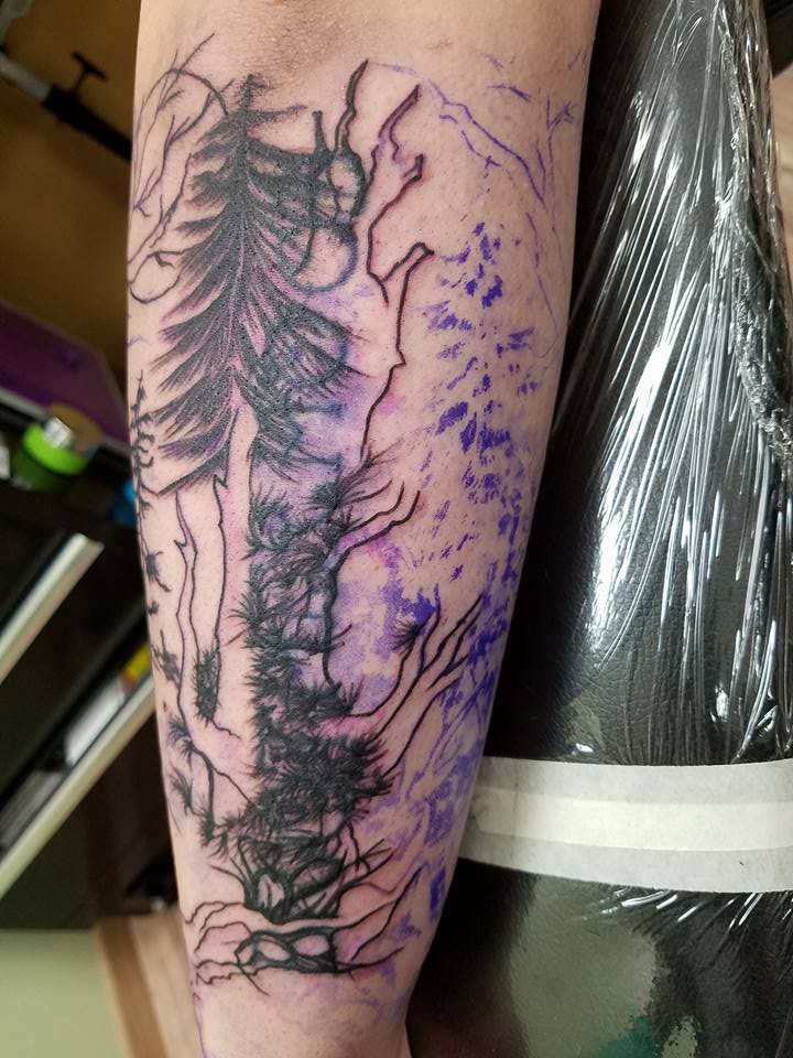 Half sleeve cover up tattoo with line work