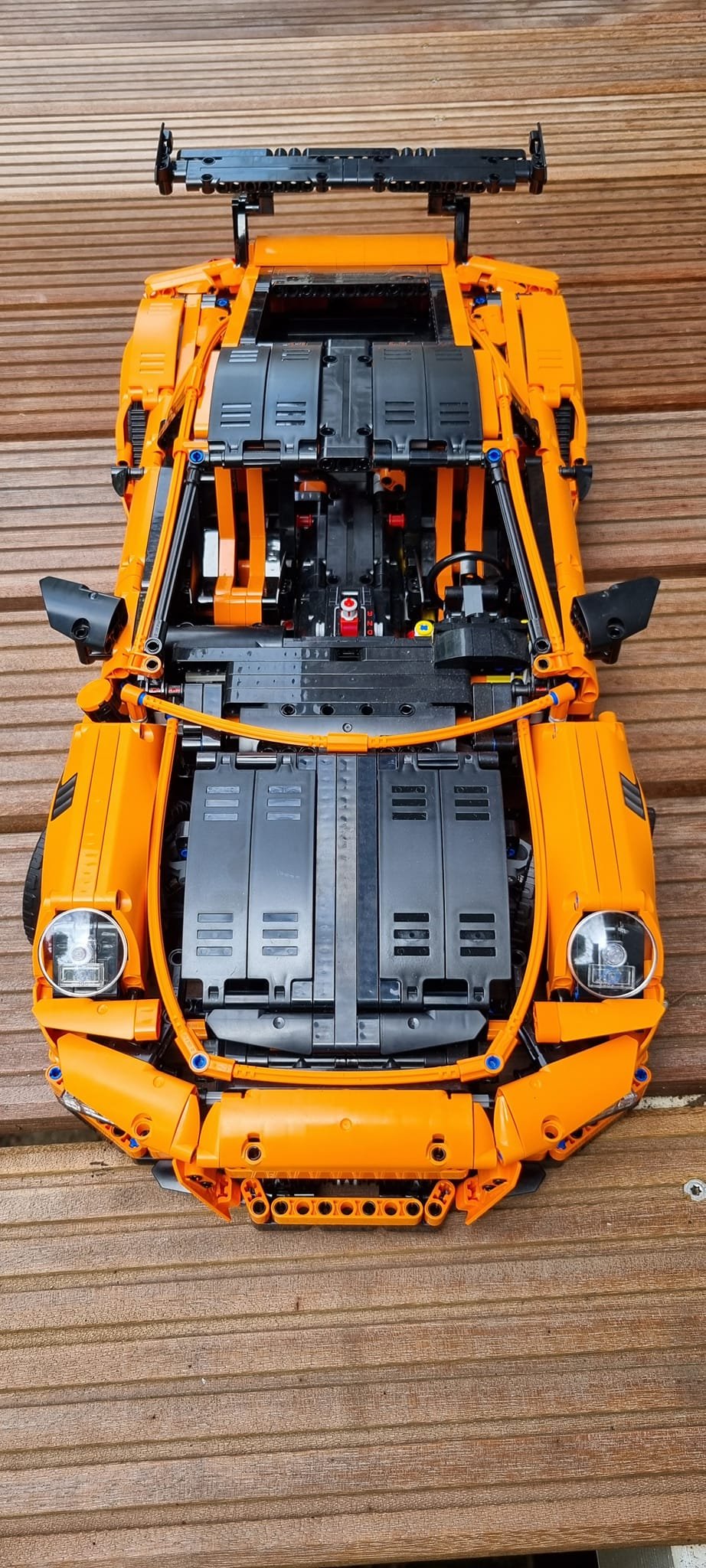Modified Lego Chevrolet C3 SC with black wheels and spoilers