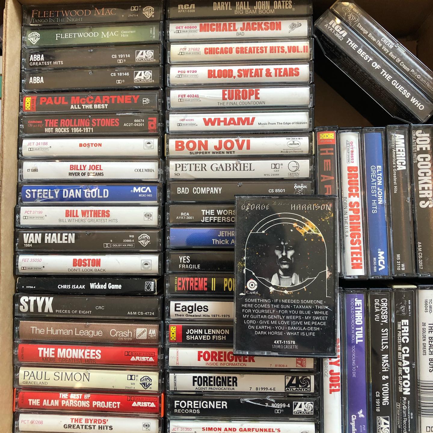Large rock music collection on cassette tapes, CDs, and vinyl