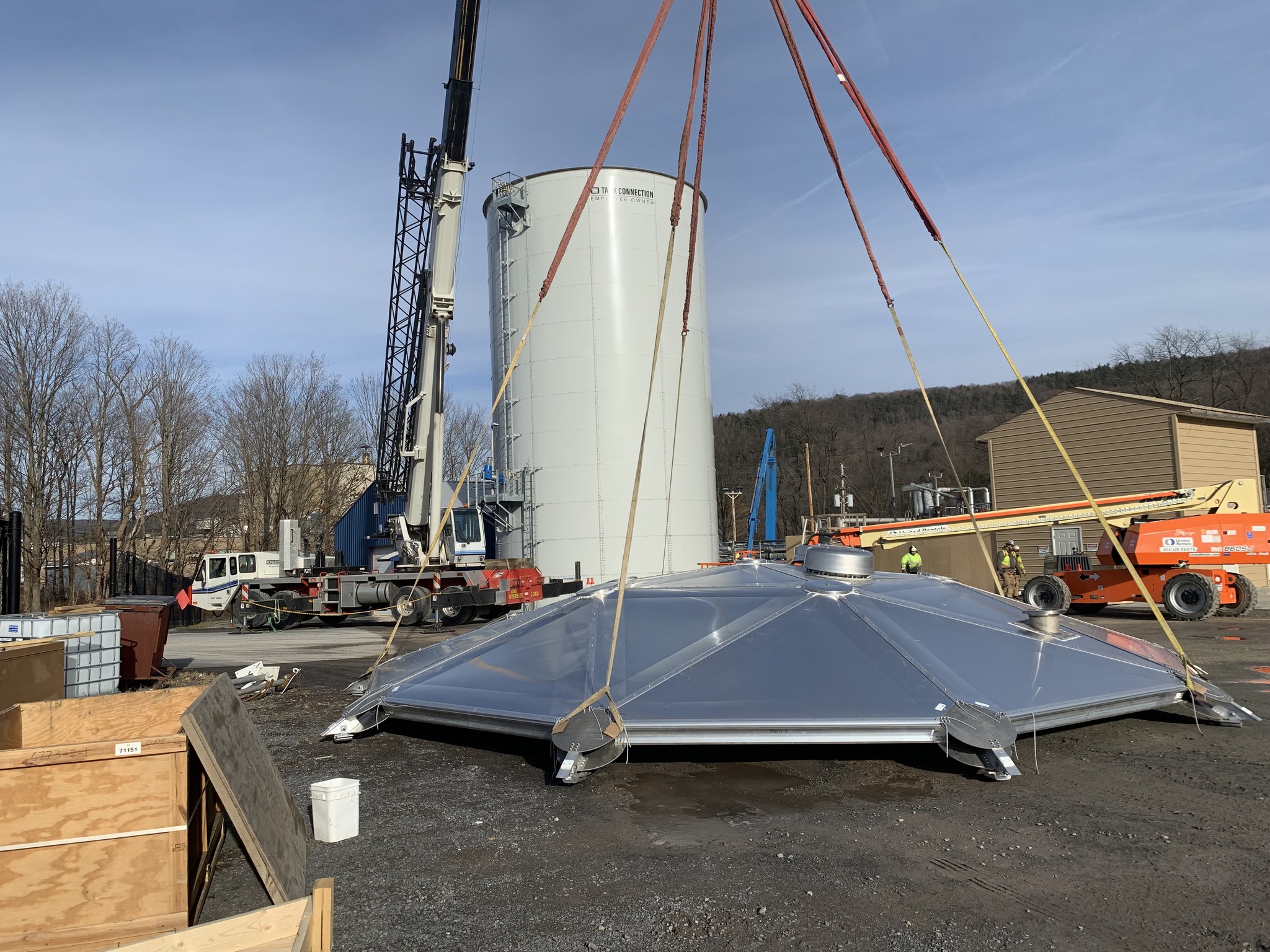 Installing a Water Tank Cover - Eastman Crane & Rigging