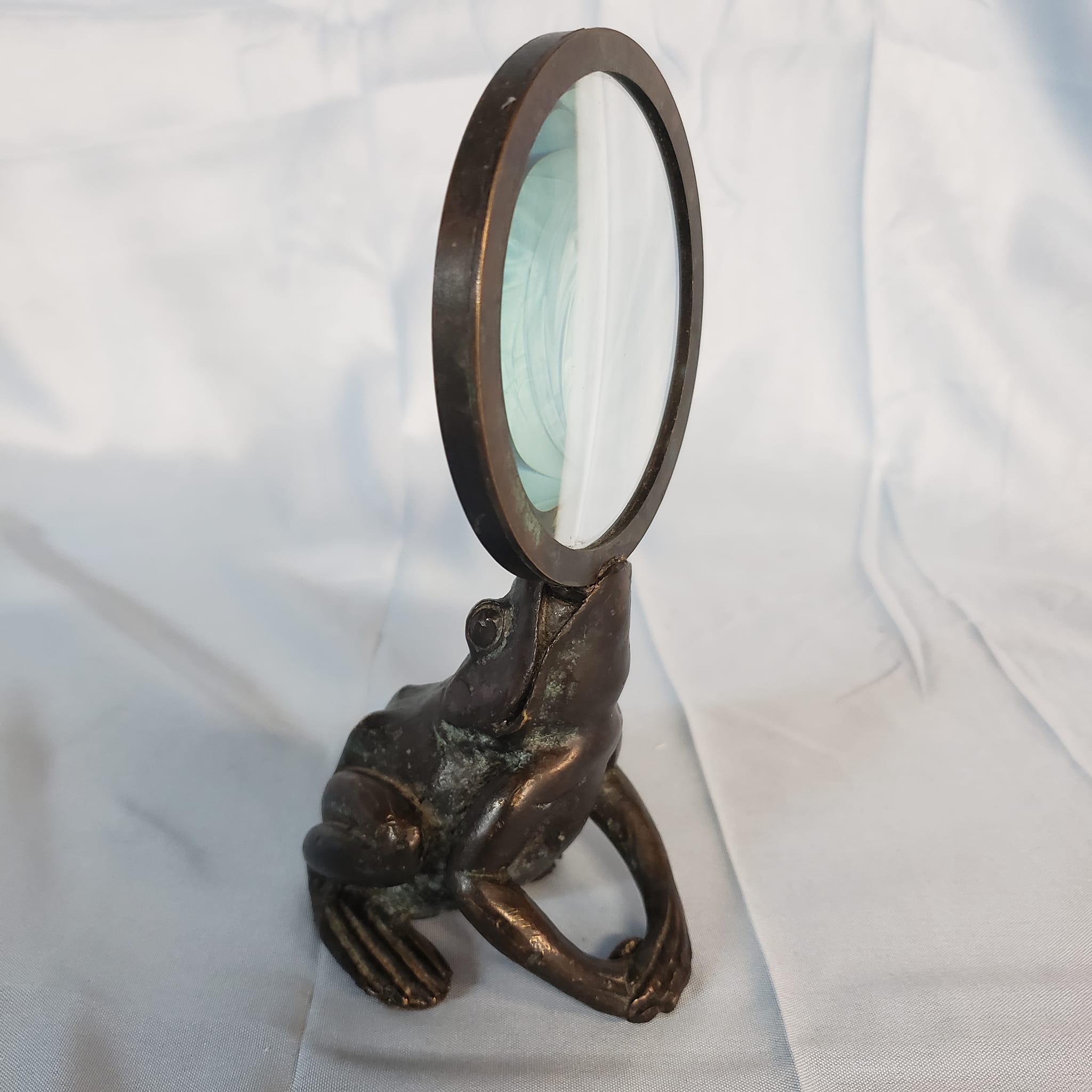 What brand is this vintage magnifying glass with a light?